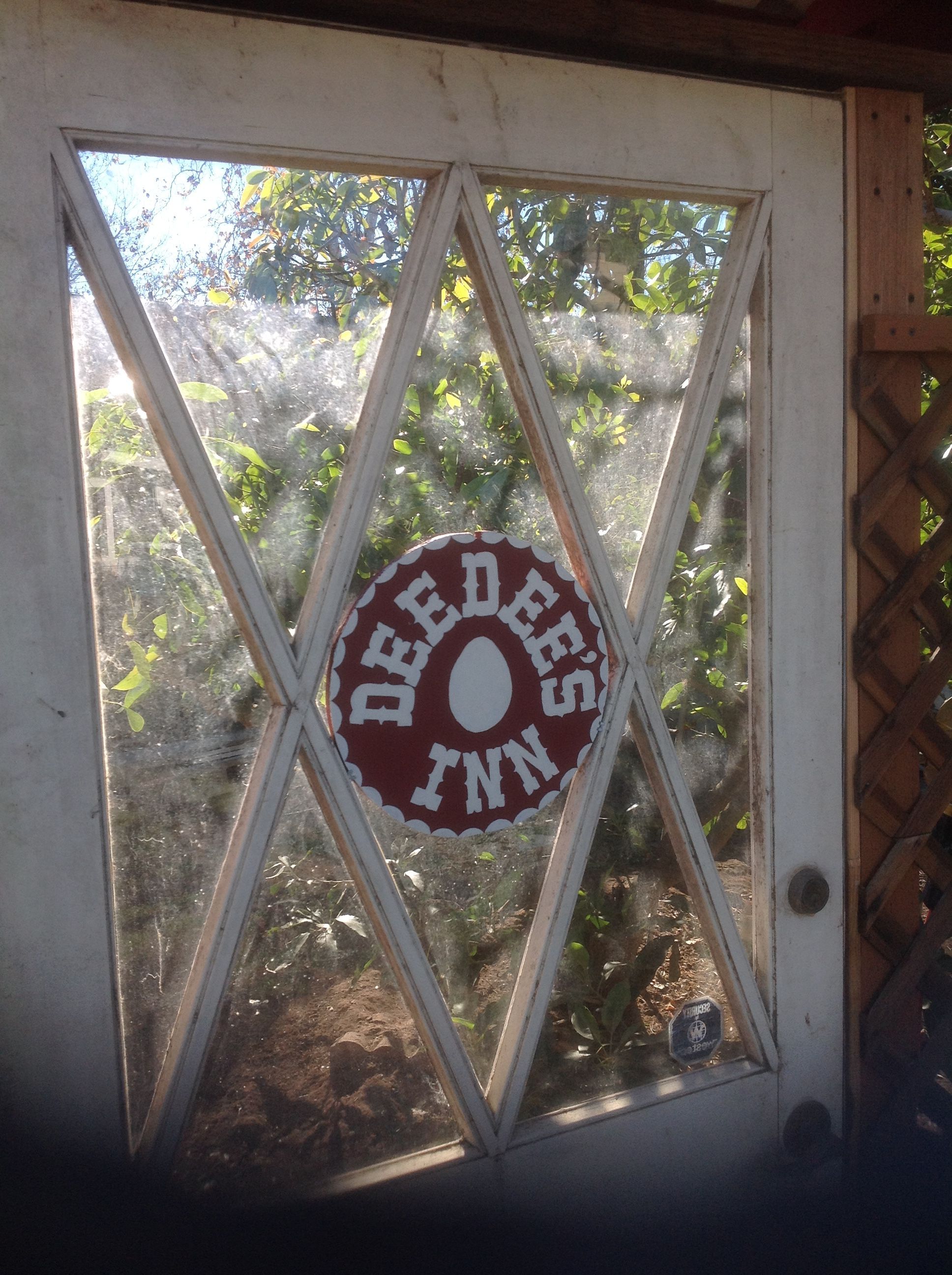 I had had this great old door for a few years, also a free Craigslist find. It became the door to the chicken yard.