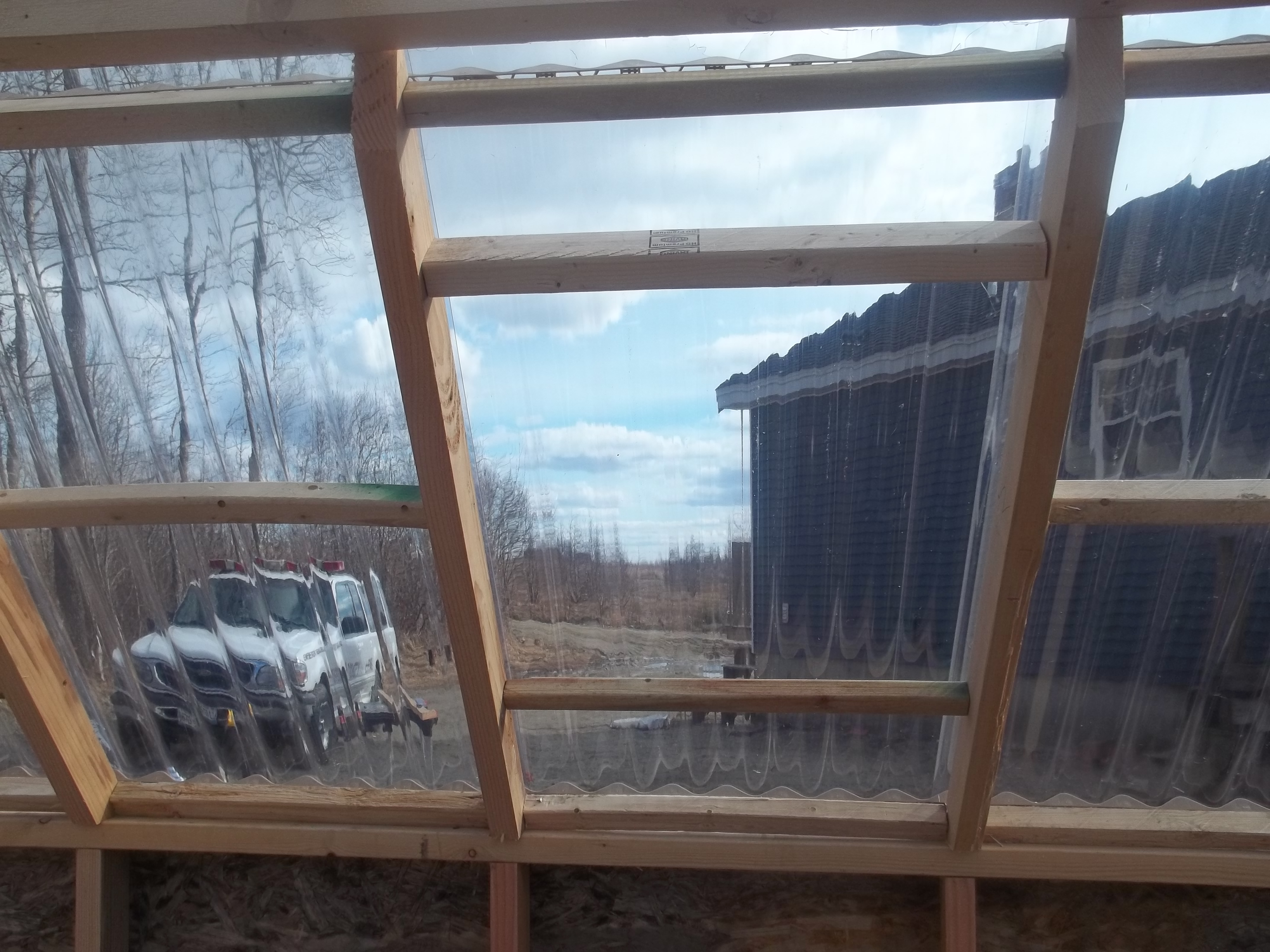 I had to put in purlins to support the sheets.  They were almost too flexible without the cross members.  Again, cull lumber!