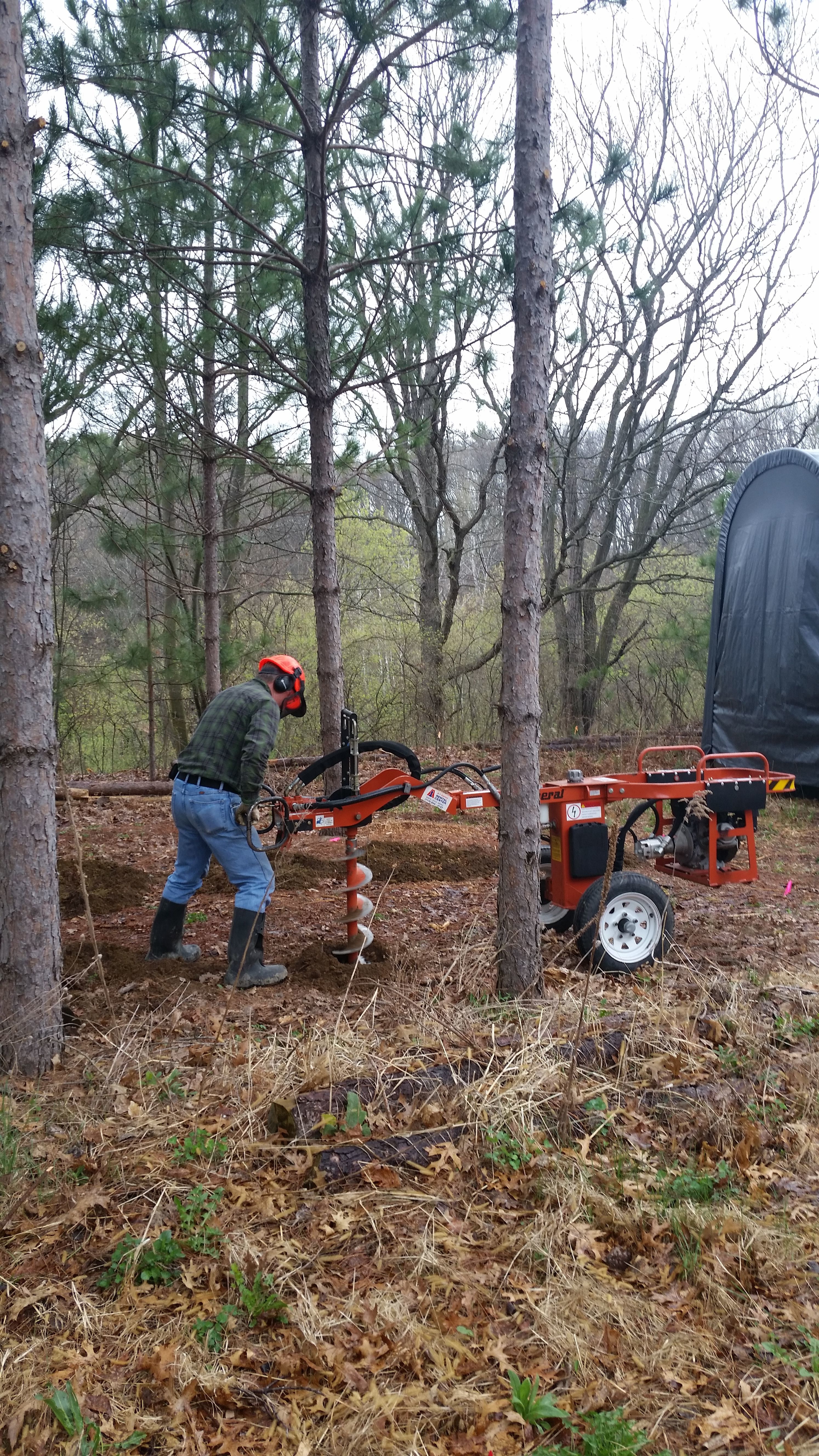 I learned my lesson after the last fence we installed in this rocky soil.  This is way better on my body than a post hole digger.  Faster too since it was raining shortly after I finished putting in the support posts.