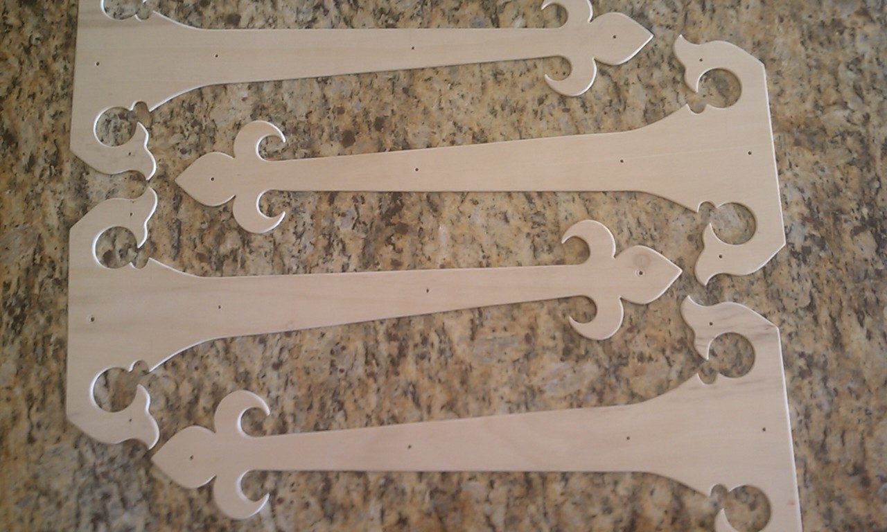 I made the hinges from 1/8" stock I had and just painted them with a hammered black spray paint.