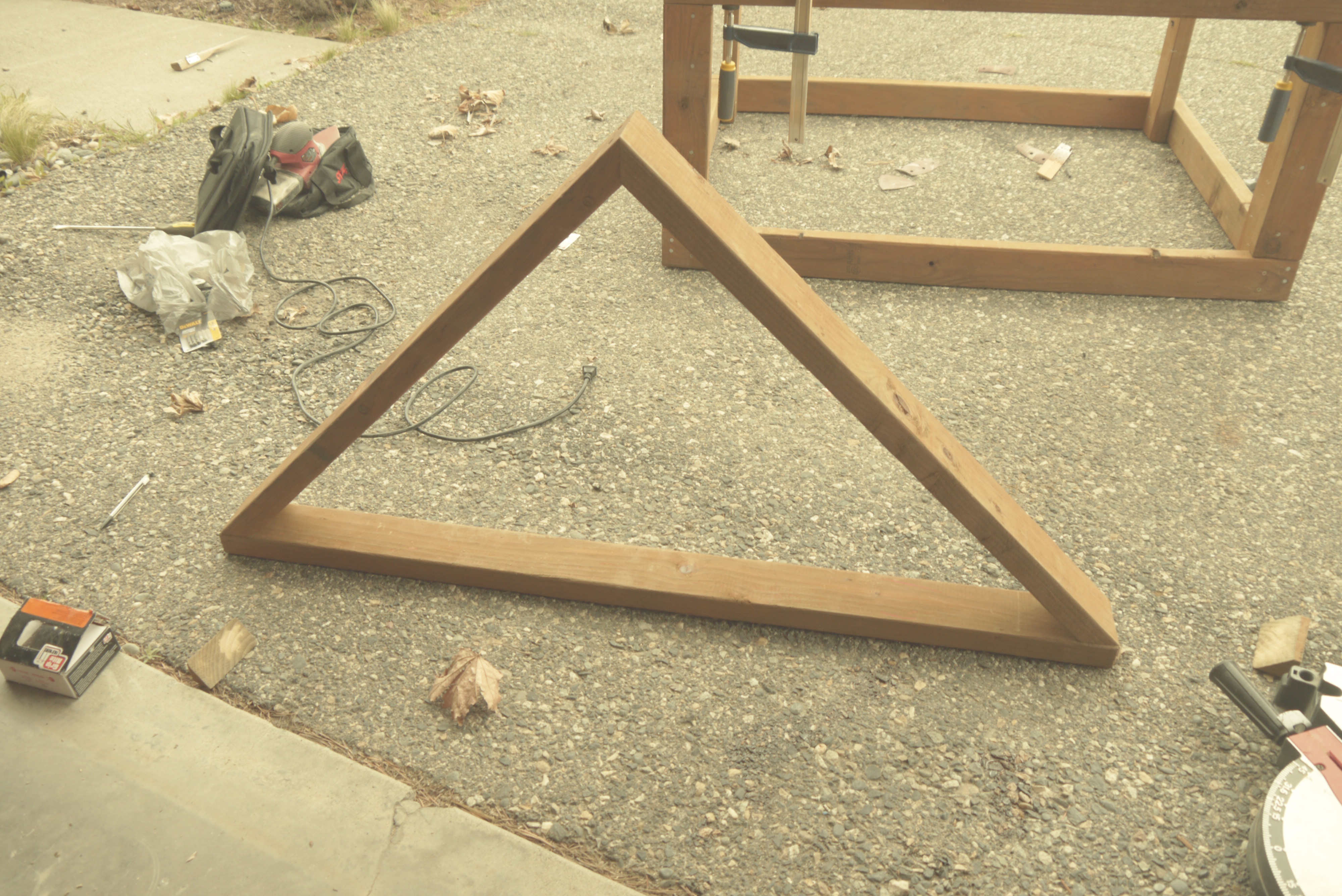 I made two of these 4 ft long by 2 ft height 45 degree pieces to put on top of a 3x4 open box I had made for the birds to live in while inside.  This would complete front and end wall frames.