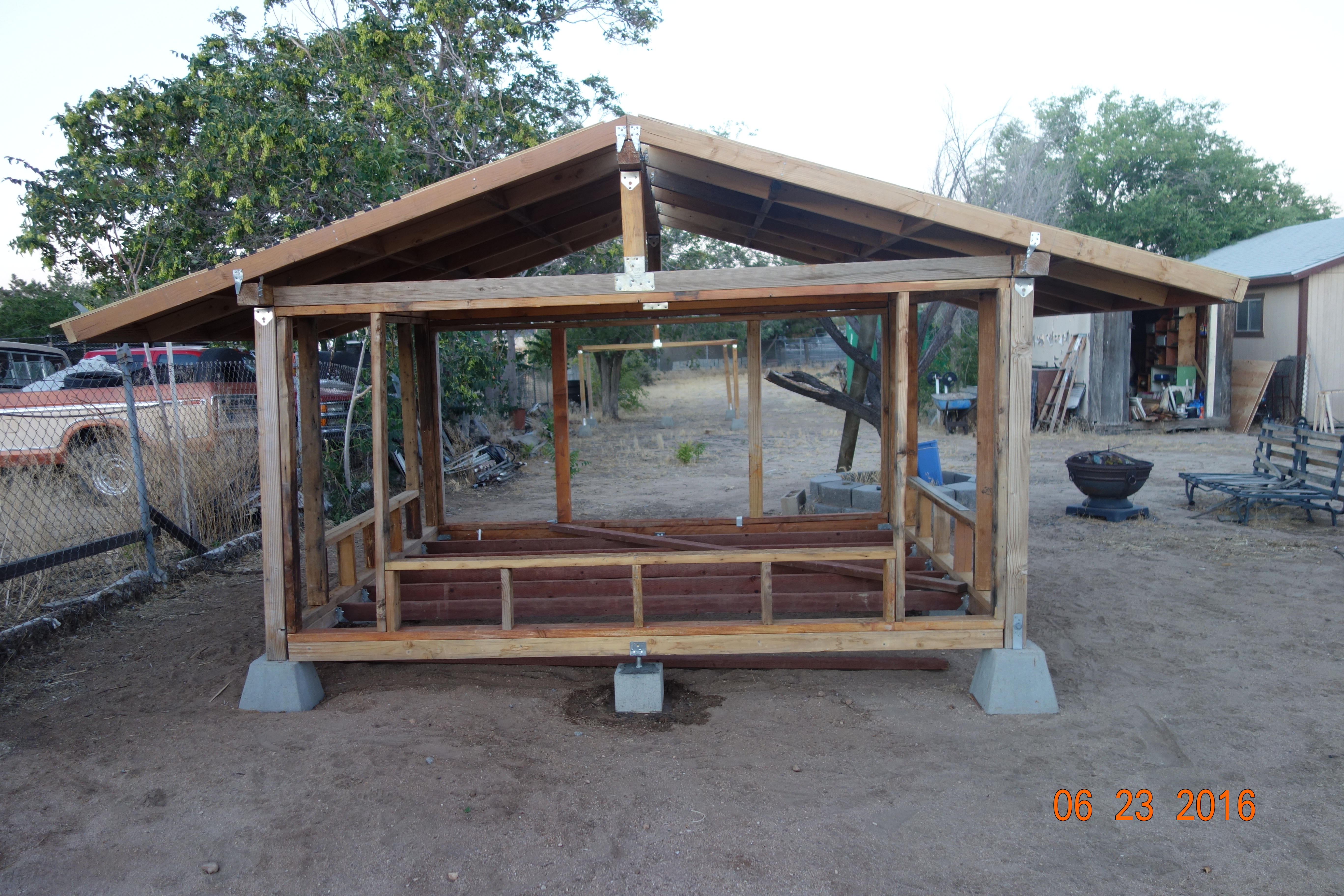 I started my first chicken coop this way. I over-extended the length of the coop to provide shed for the nest boxes  during rainy days.