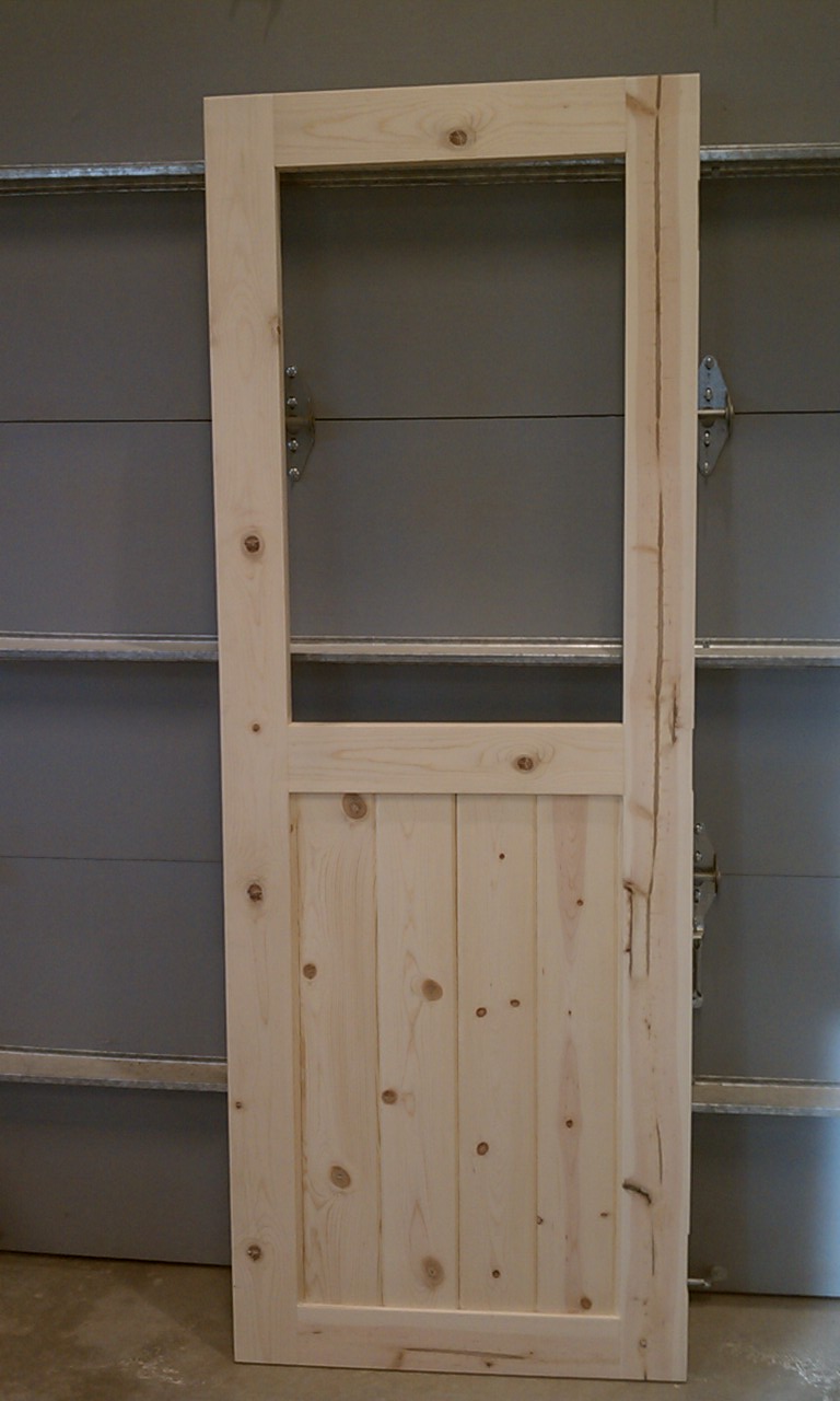 I still need to add the hardware cloth, but this is what it looks like.  It's a standard height 2-8 door (80"tall) (32" wide).