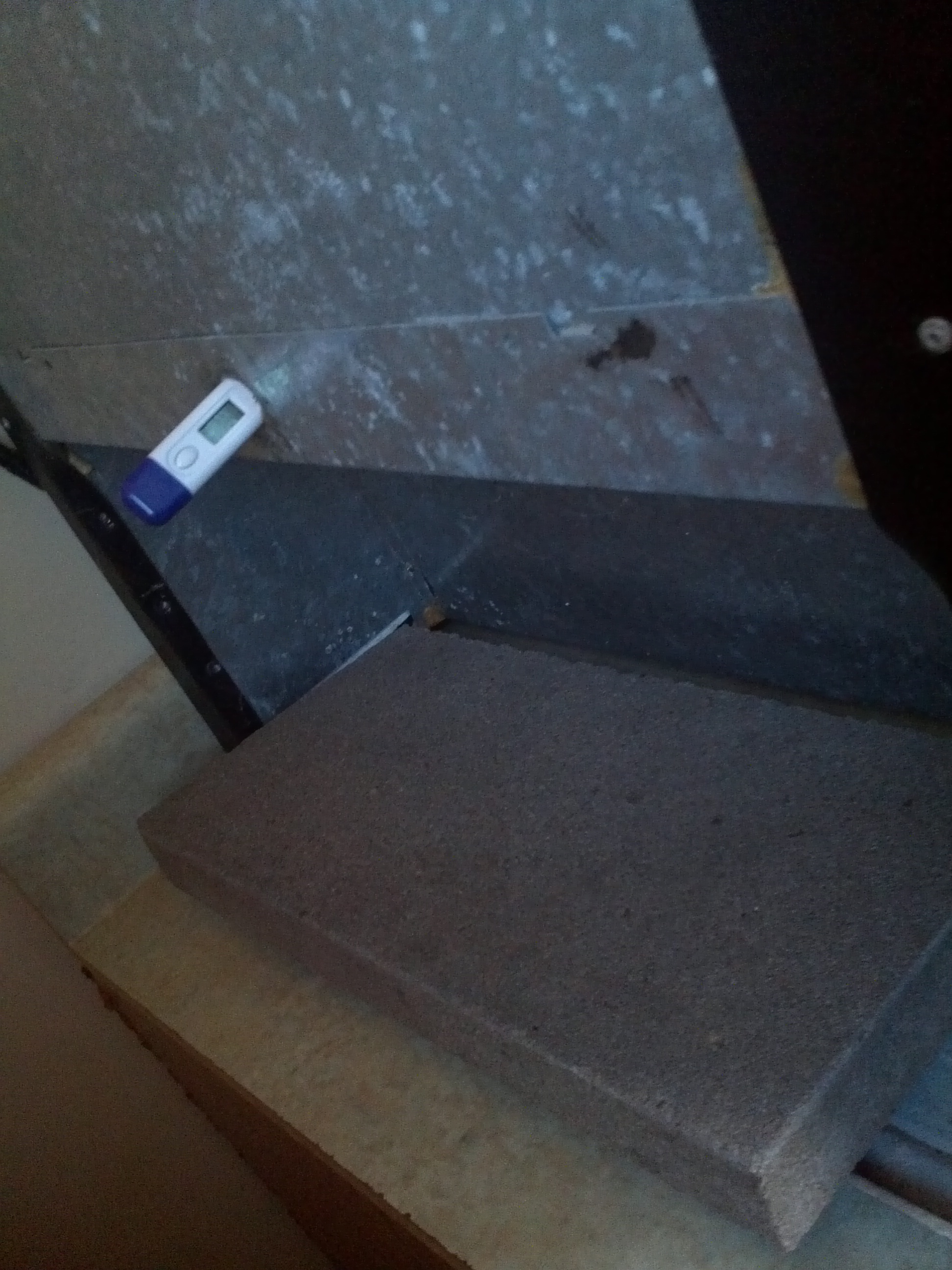 I took out the compressor and now the door is too heavy for the back side to hold it up.  So a concrete paver works great!  I don't have the weight when I go to move it and then I put it in and it holds the backside down. :)

Also how I check the temps inside the incubator.