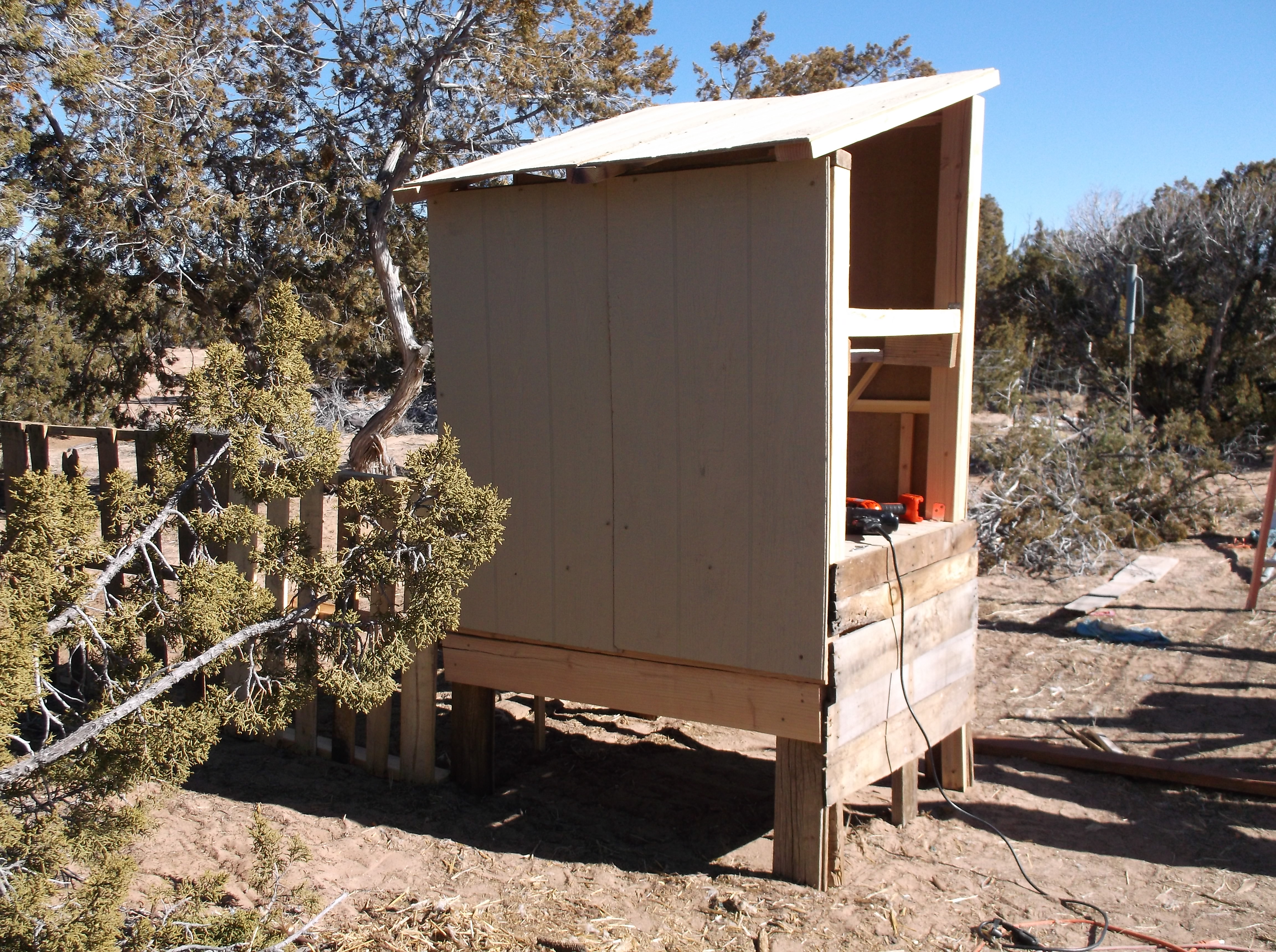 I'm using scrap wood at the bottom of the south side of the hutch.