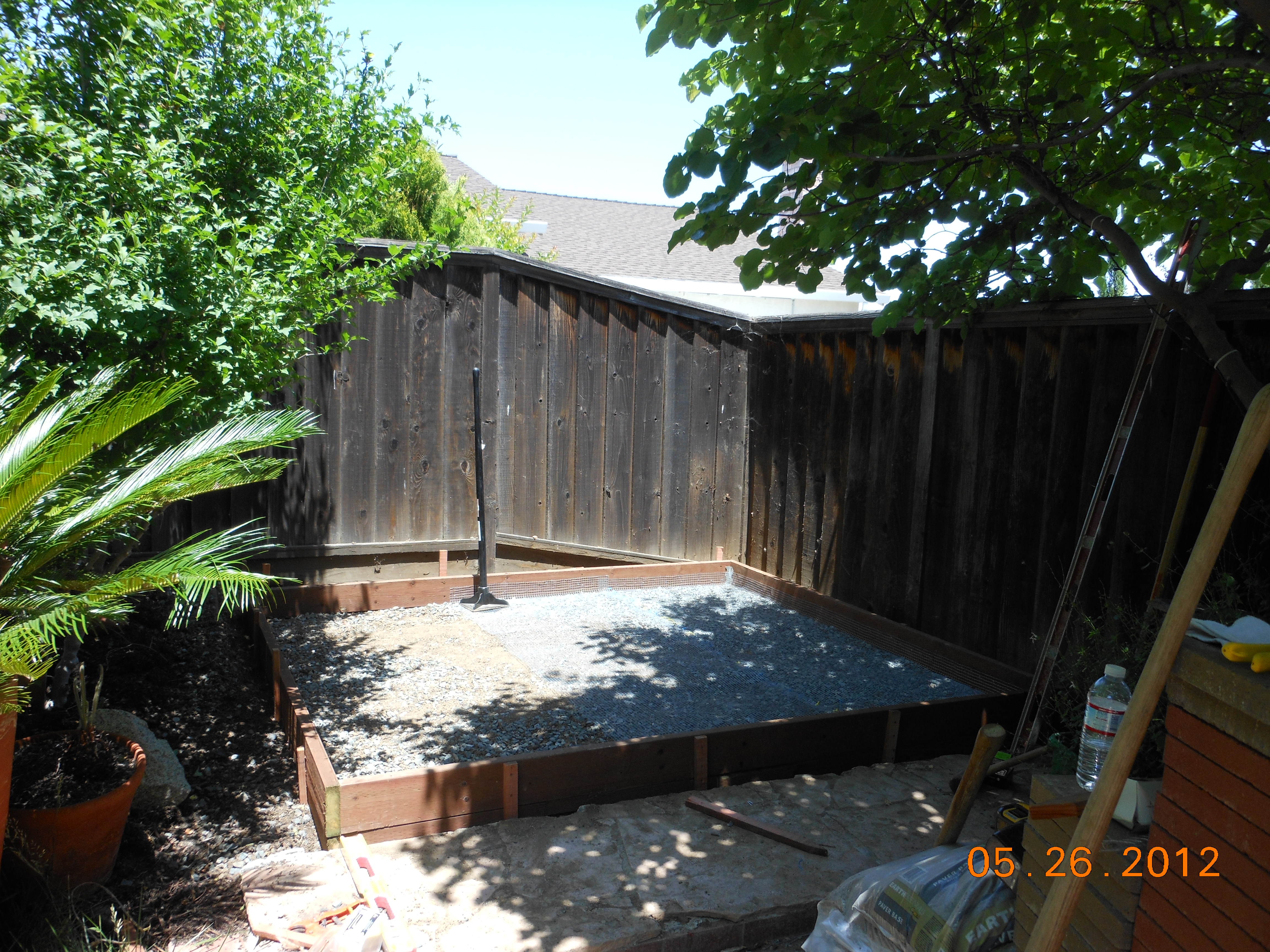 "In the Beginning" 
The foundation and bottom of the run were going to be pavers.  As I researched coops on this site and others,(very helpful by the way)  I decided on using sand or River Sand. So this meant changing our plans already.