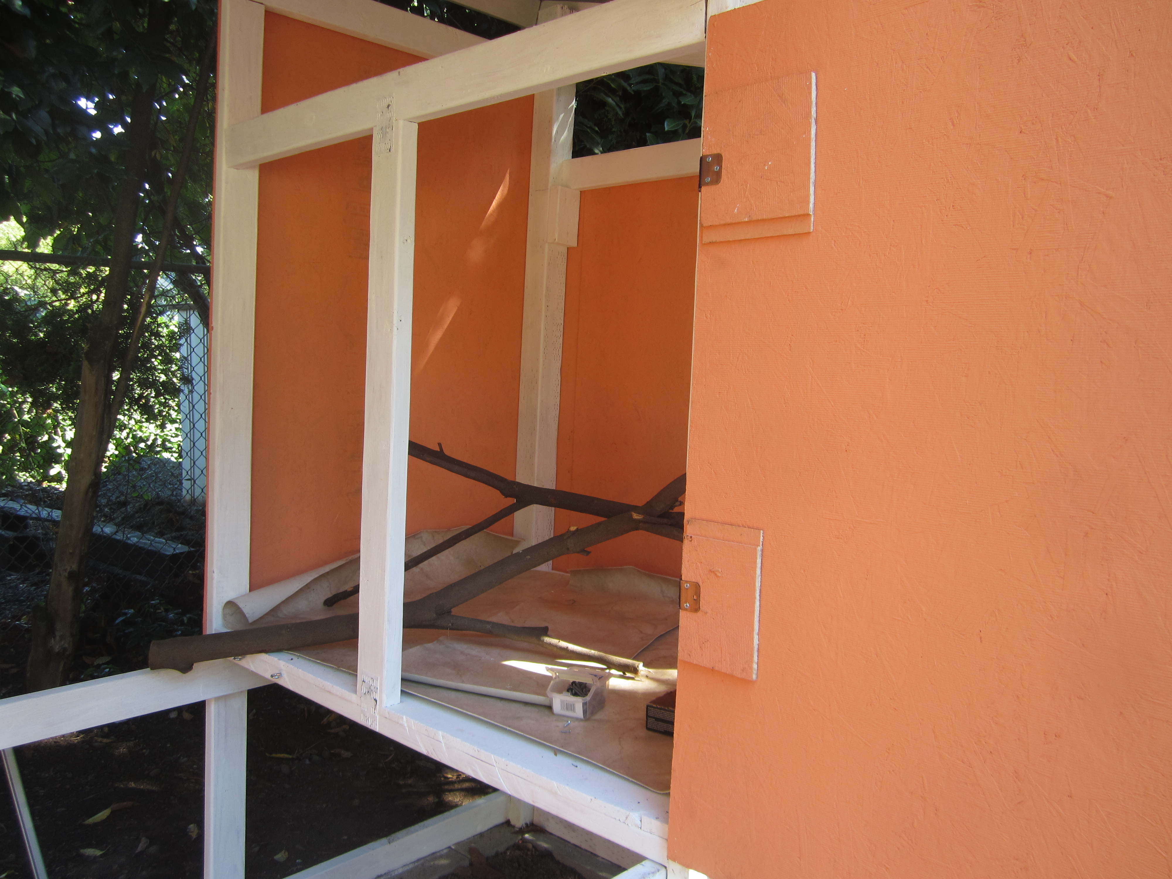 inner roost walls on hinges so we can open it up all the way