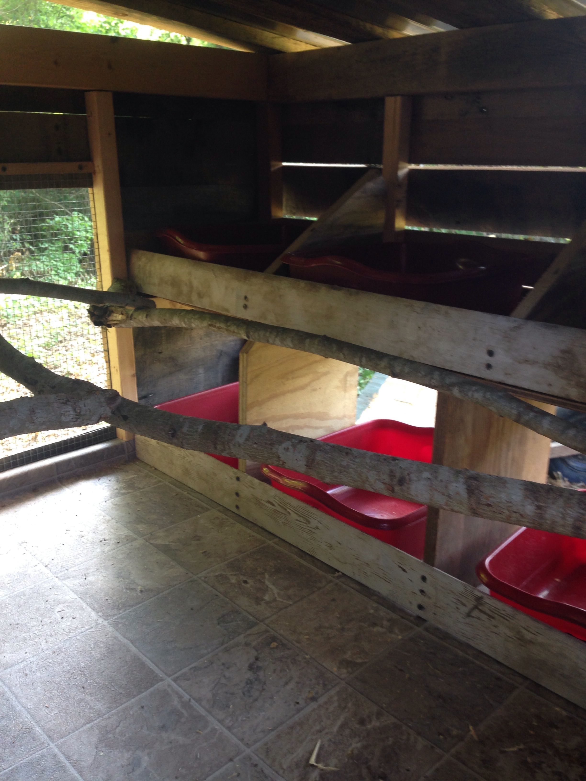 Inside I used dish pans and roll flooring for easy cleaning