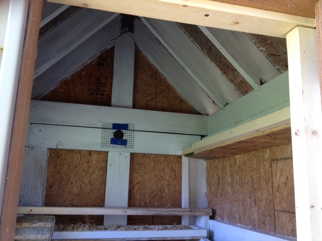 Inside of coop.  Two roosts with poop catchers underneath