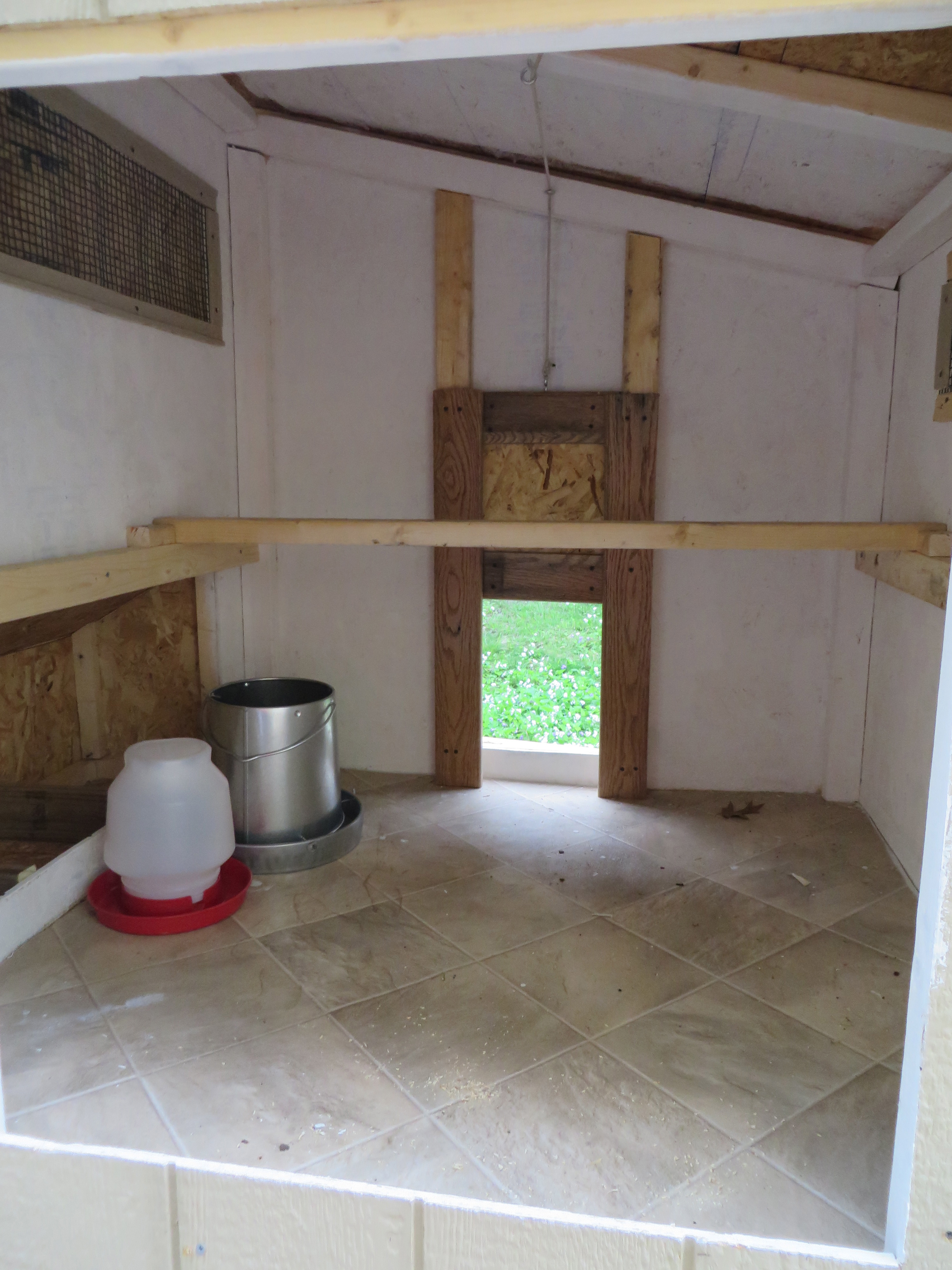 Inside the coop. Food and water actually stay out in the run. This was taken before the chickens moved in.