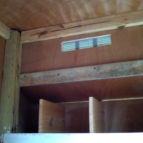 Inside view of nesting area showing vented top.  Coop vented on 3 sides.