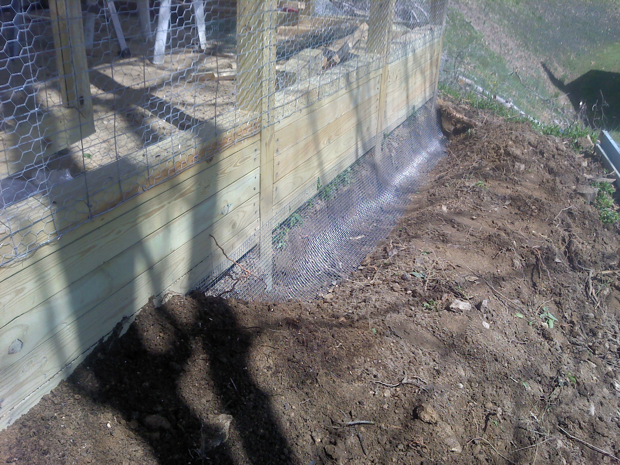 Installed hardware screen on the outside and backfilled.