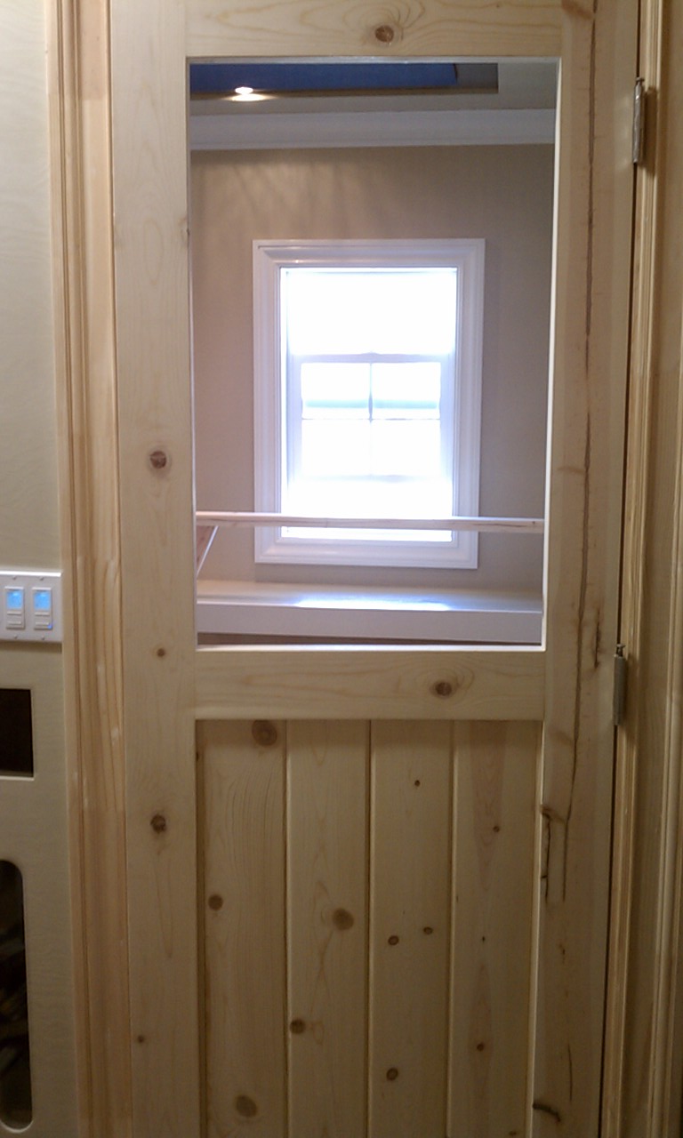 Installed view from the human side.
I'm just going to bore for a standard house door knob and lock.