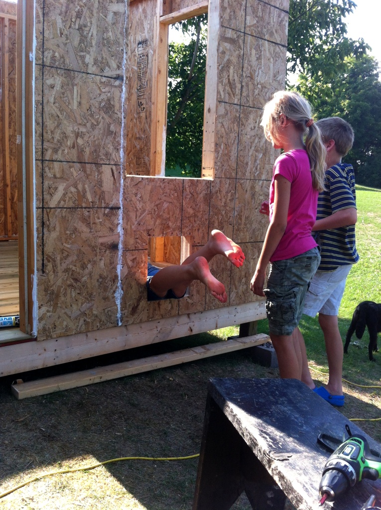 Jasmine showing the younger kids how the hens will enter the coop- hopefully the chickens will do it more gracefully
