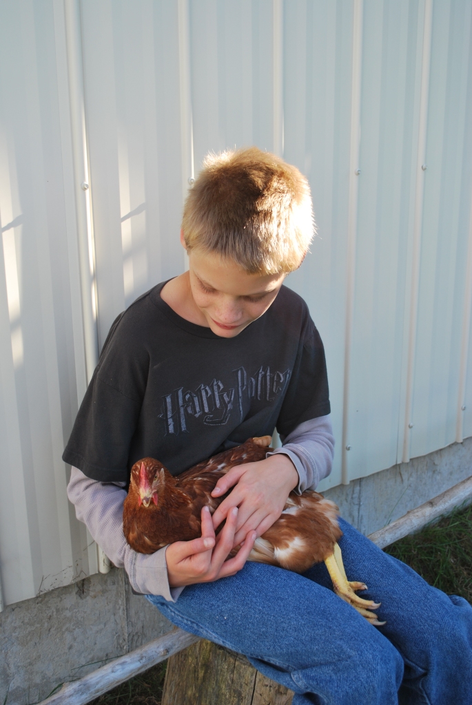 Jim holding his chicken Bob