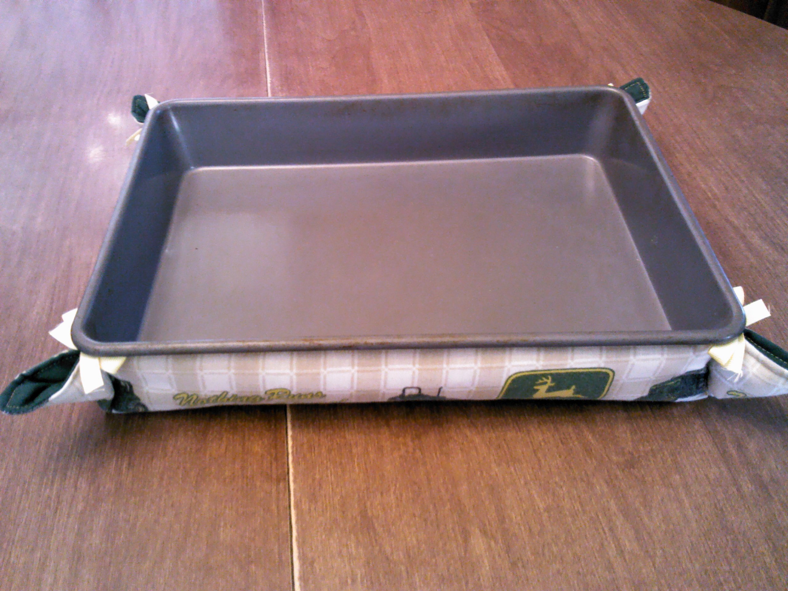 John Deere patterned with green lining and yellow ribbons.