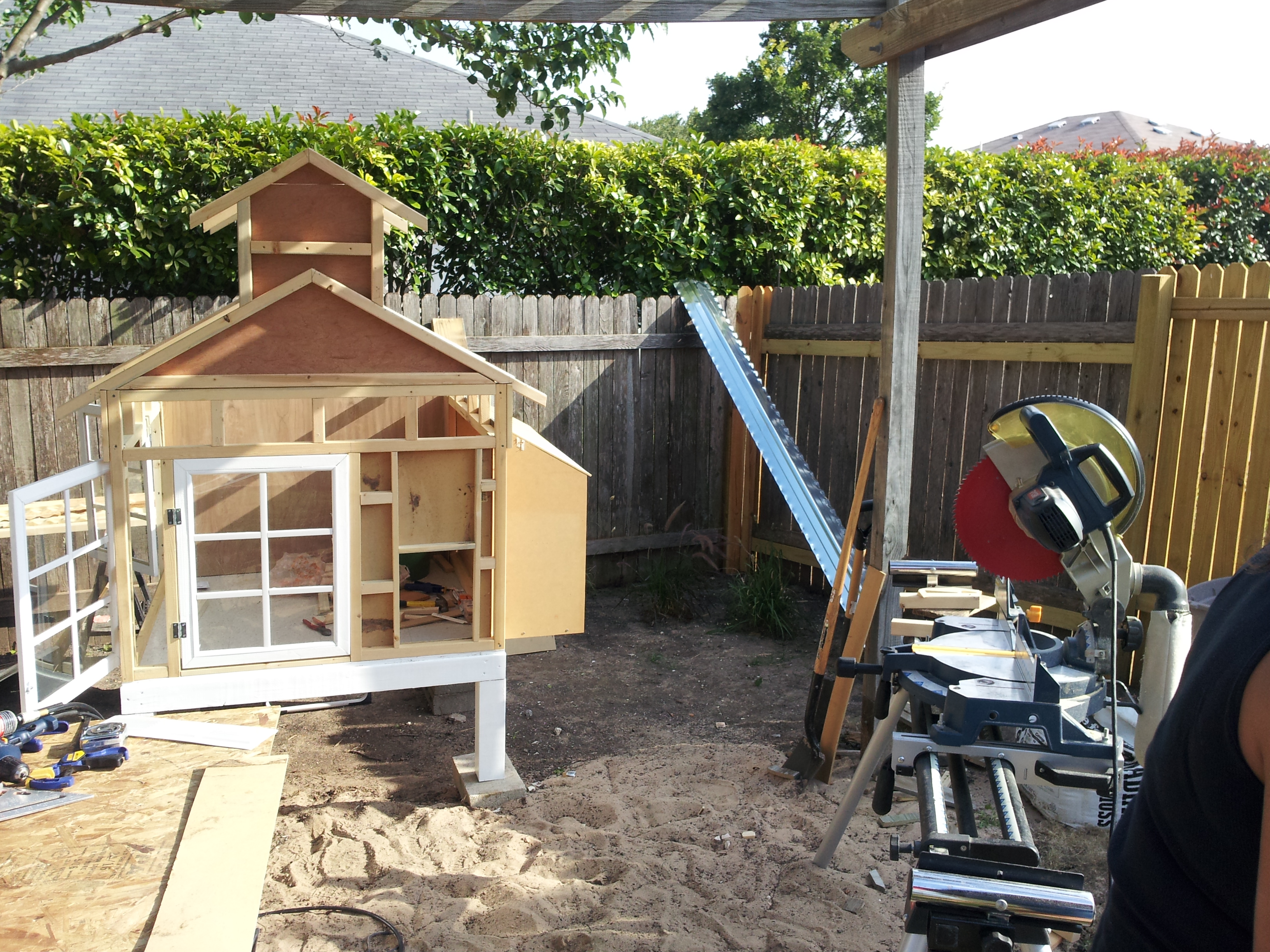 Just moved the coop into position, it is on a 4 x 4 base with a cheap laminate flooring my wife found.  Preparing to put the siding and the roof on.