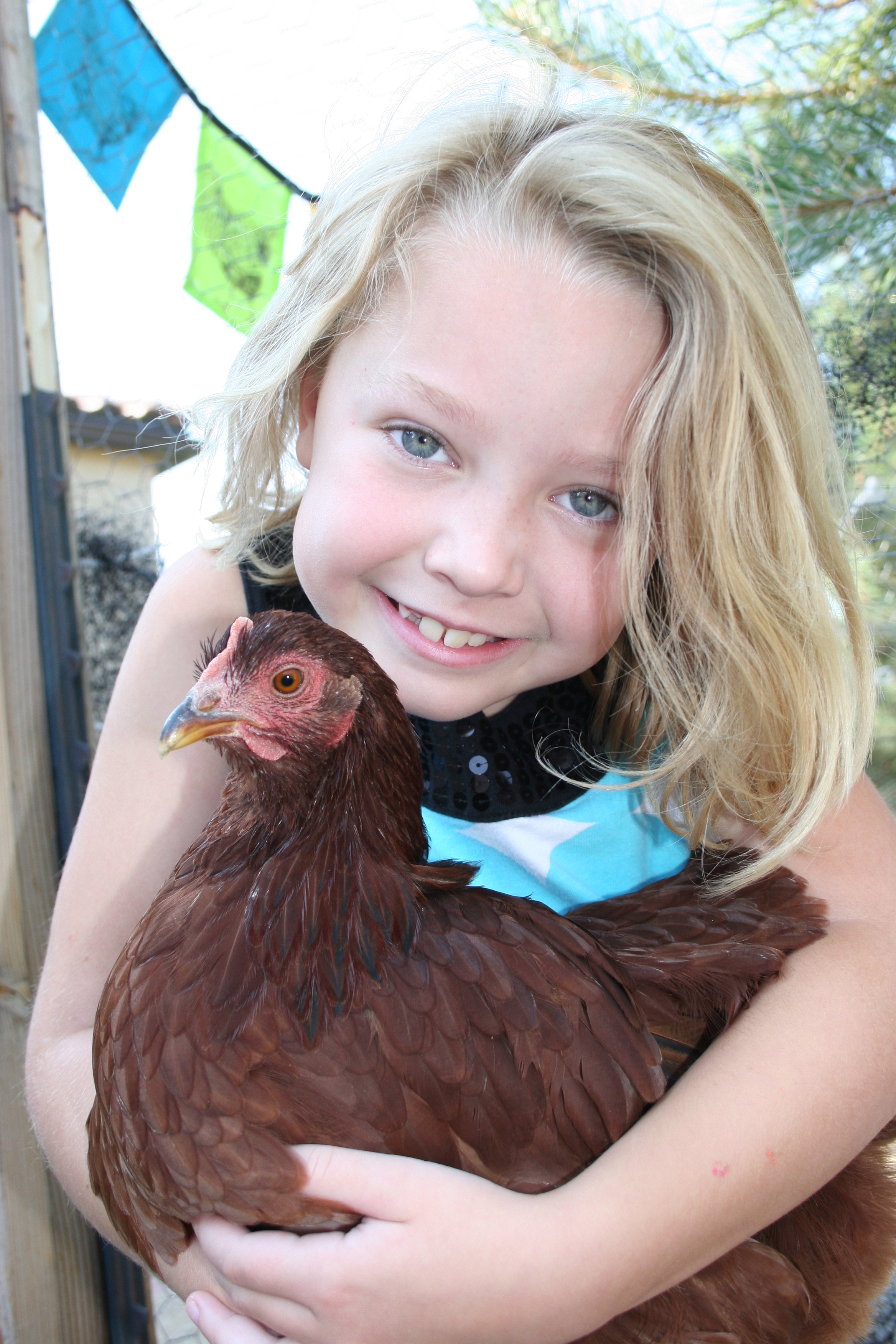 Kathryn and her pet chicken Buttercup.