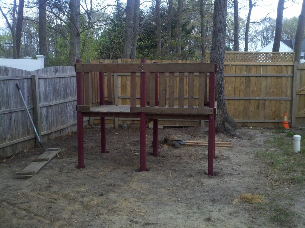 Kids old swingset,  dropped the legs down about 2 feet, poured concrete into holes to give it structure.