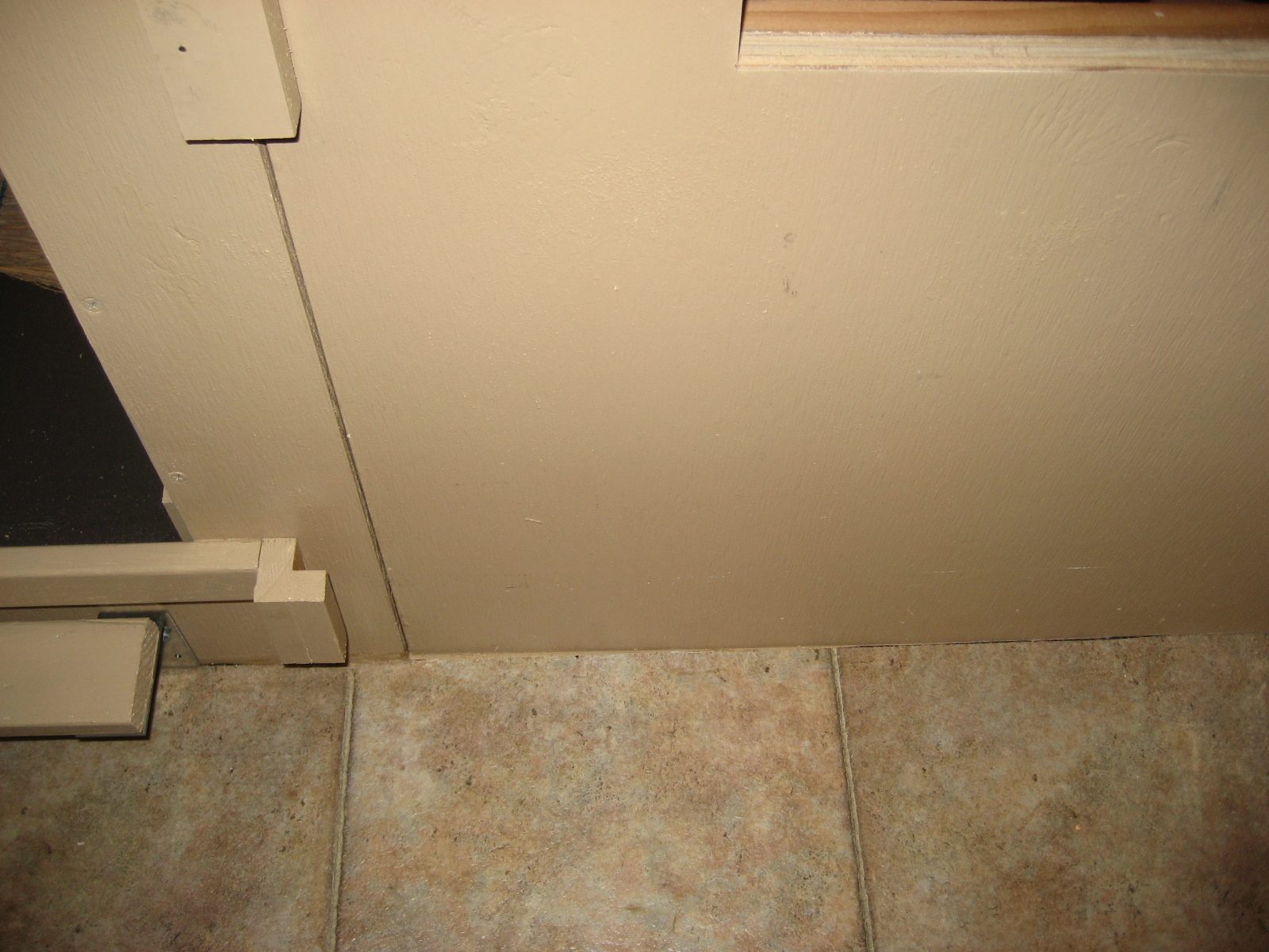 L-shaped piece of wood for door block