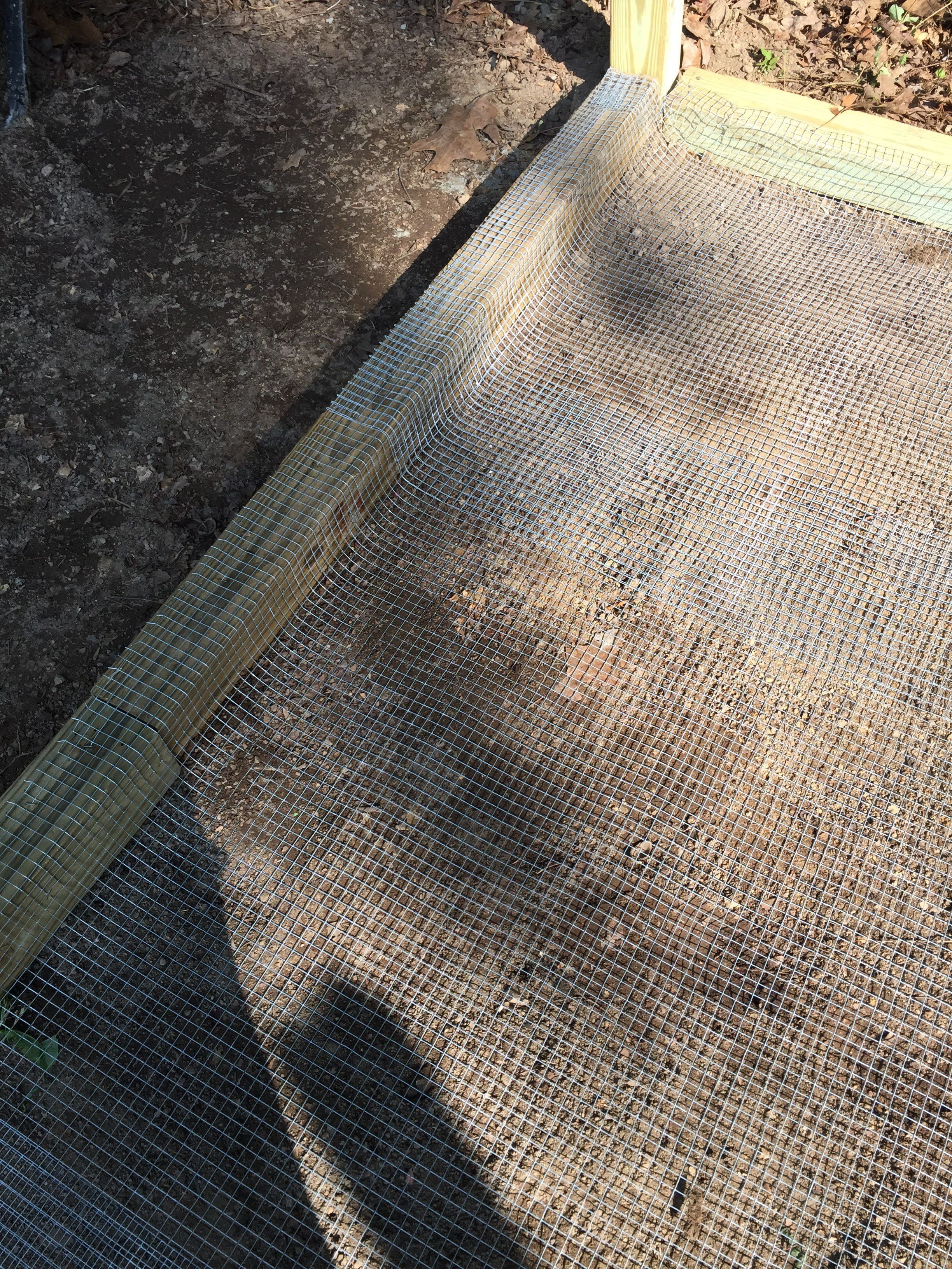 Laying the hardware cloth. Getting ready for the sand BackYard