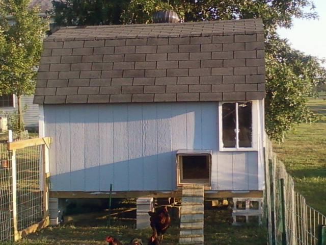 Left side with the opening and ramp, old window reused to provide light.