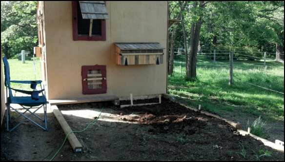 Leveling area to make an enclosed run. They will have a dust box underneath the nest boxes
