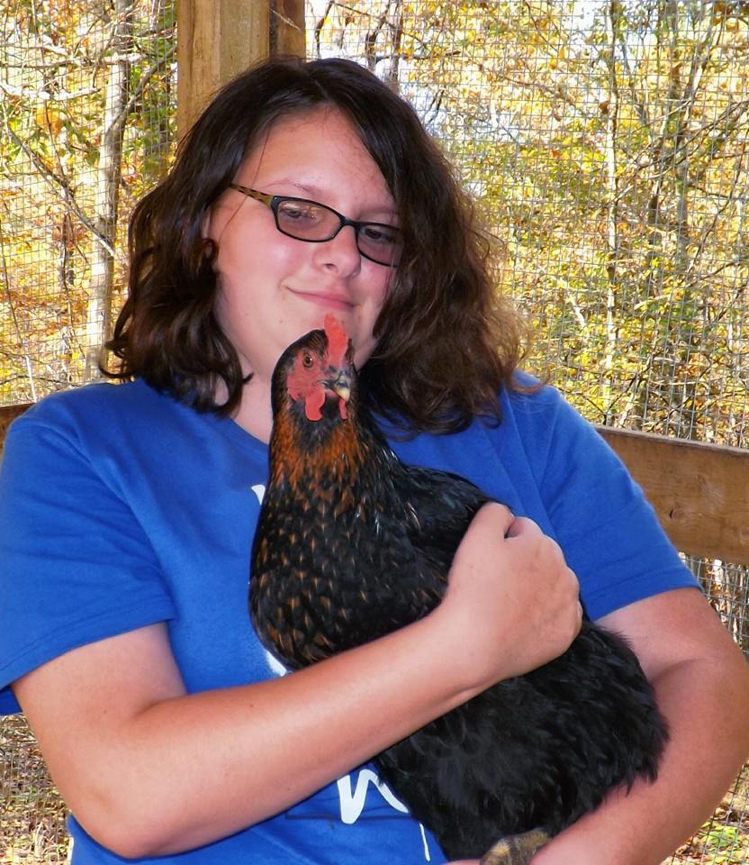 *
Lilli LOVES our chickens!