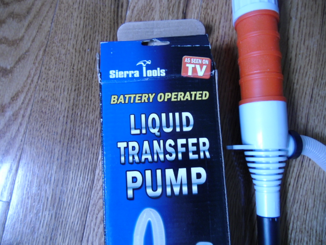 Liquid transfer pump, I purchased this one for under $7.00.  Its worth it's weight in gold.  It empted my kiddy pool which was 3/4 full in just over 7 minutes!  But I do suggest adding a cut off piece of hose to drain the water further from the pool.