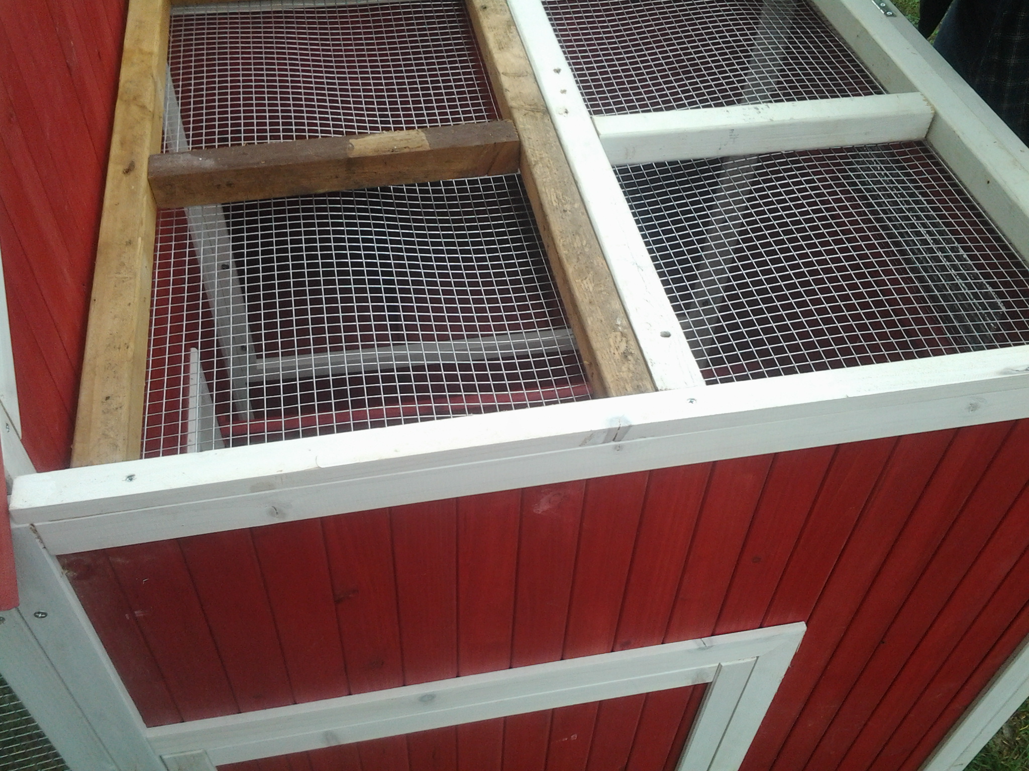 Loft 2x2 frame for added support with hardware cloth for security and ventilation as well as hold heat lamp