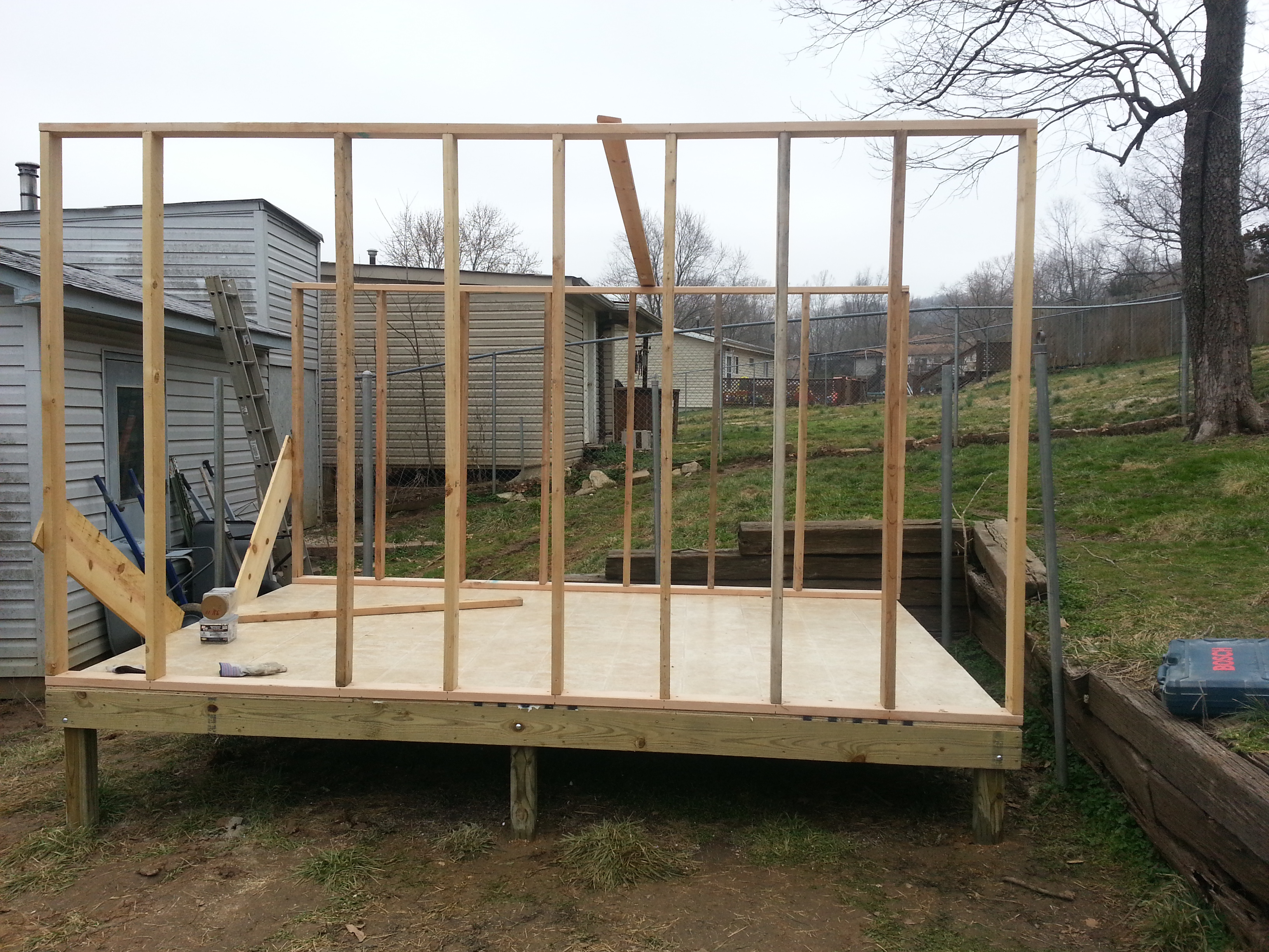 Made a 12'x7' foot high frame using 16" centers allowing for a 28" door way.