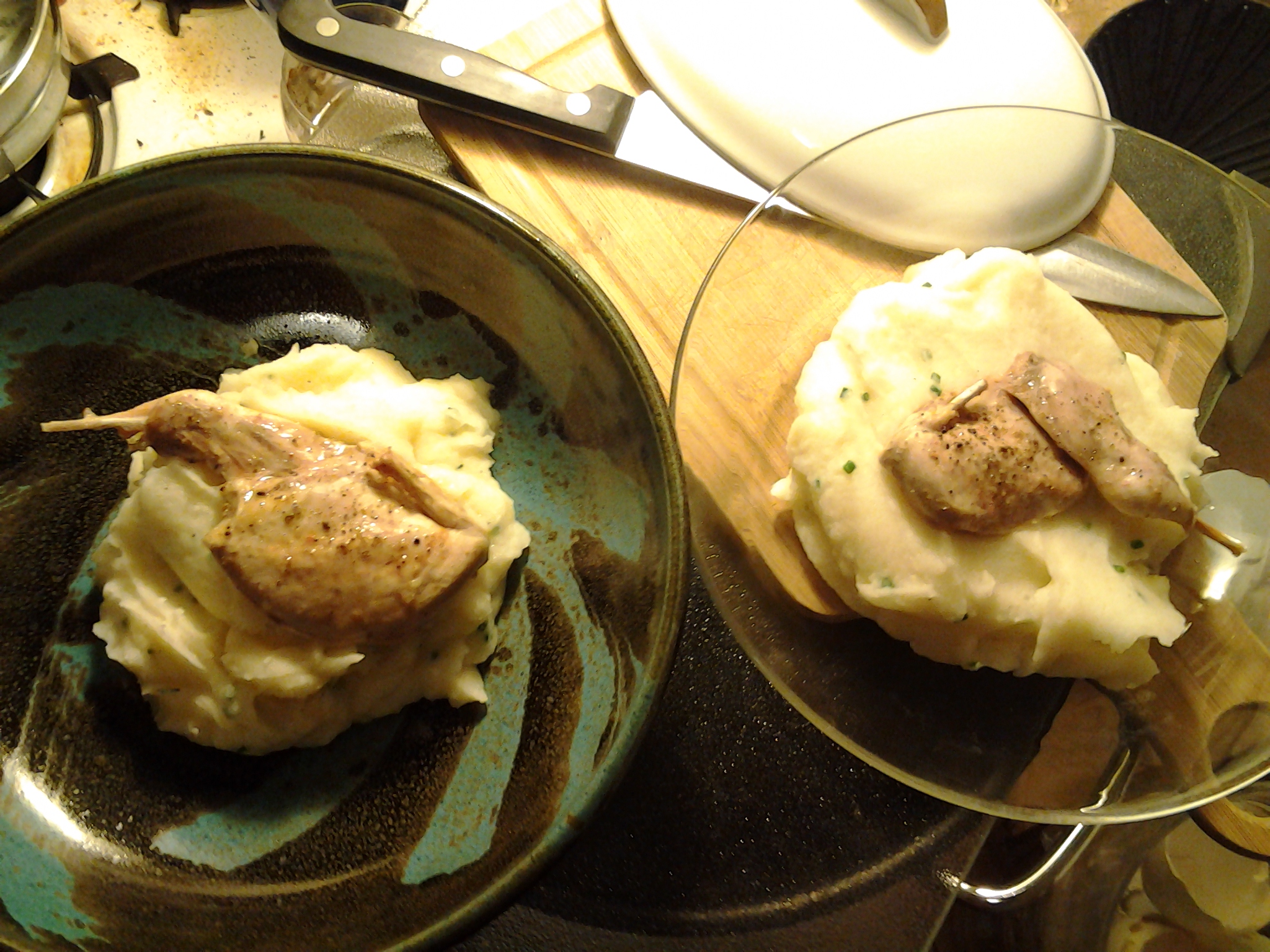 Main course of baked quail over a bed of chive mashed potatoes.  I went very light on seasoning the quail, just a little olive oil with some pepper and salt, so we could really taste the meat and see how we liked it.  
It turned out very yummy!