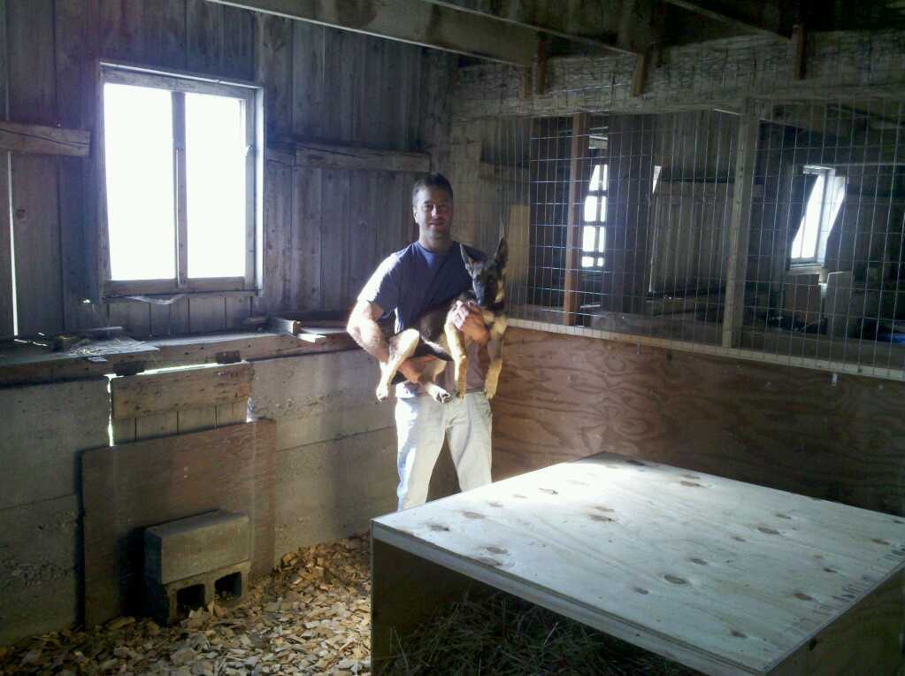 Me and Sadie in her kennel in the barn.