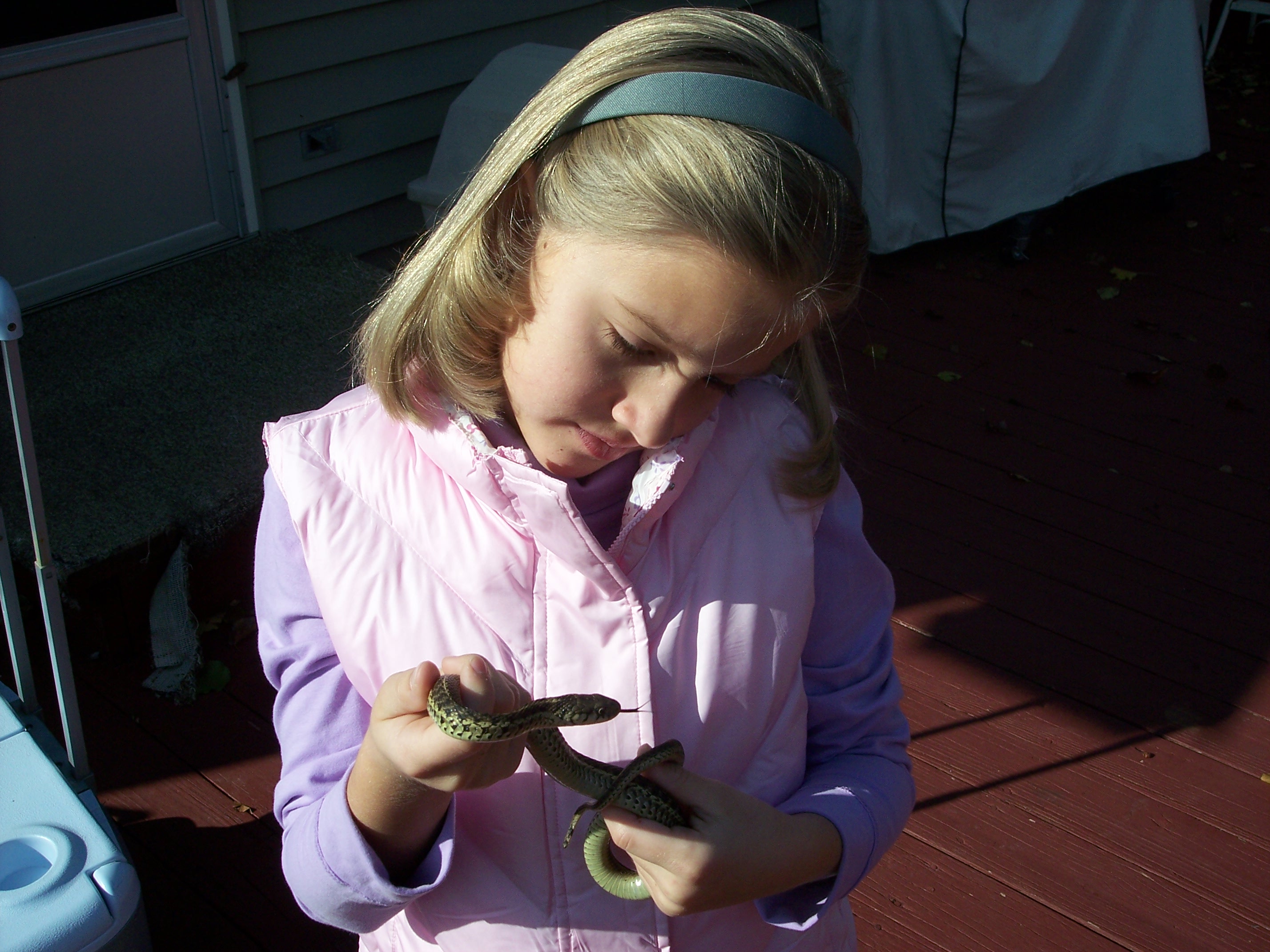 me as a little kid with a garter snake I caught lol