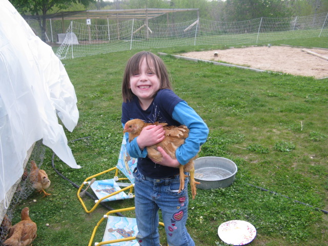 Megan with one of the chickens she raised