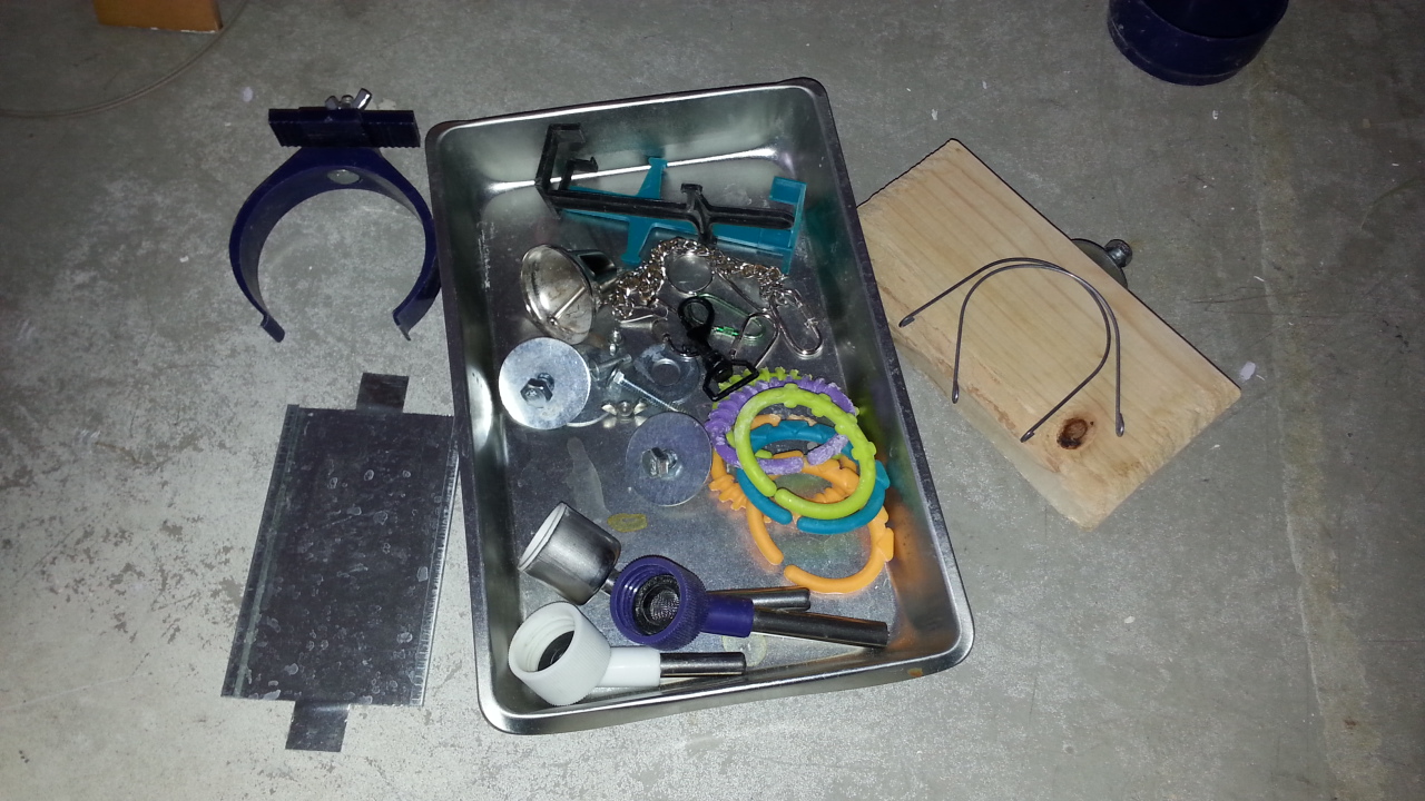 Metal tray filled with hardware and misc items
Water bottle hanger
Extra water bottle lids - sanitized and ready for use
Tons of toys clips and hangers - tested with large feeders/waters too
Removable wood shelf and extra washers/screw
Metal name plate holder (for breeding pen notes)

$5