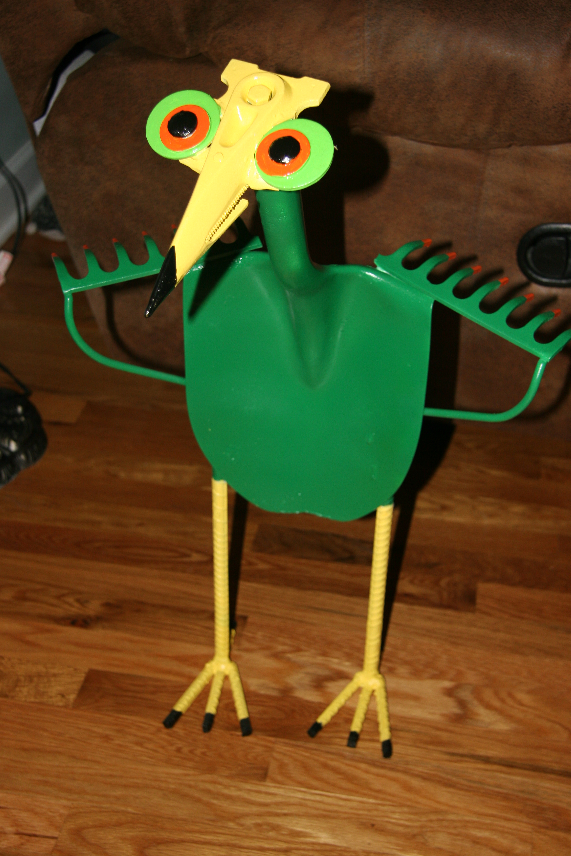 Mr. Green Beans. Up cycled from shovel, rake, rebar, bolt, washers and a farm plow part.