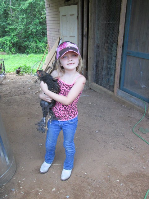 My daughter, Charlie with one of her fav GL Brahma chicks...