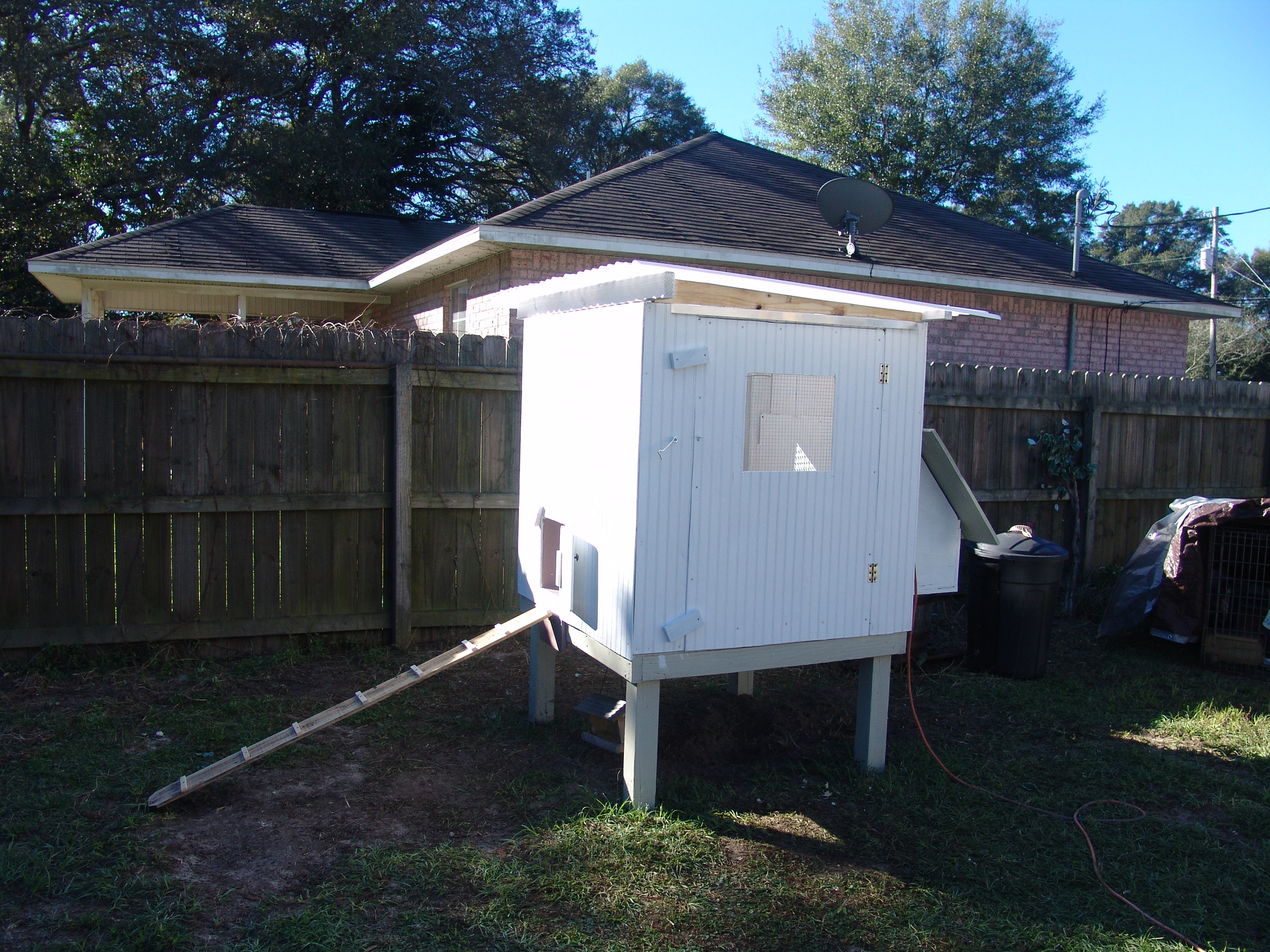 My finished coop its 4 x 4 x4 with a nest box and 24" off the ground.