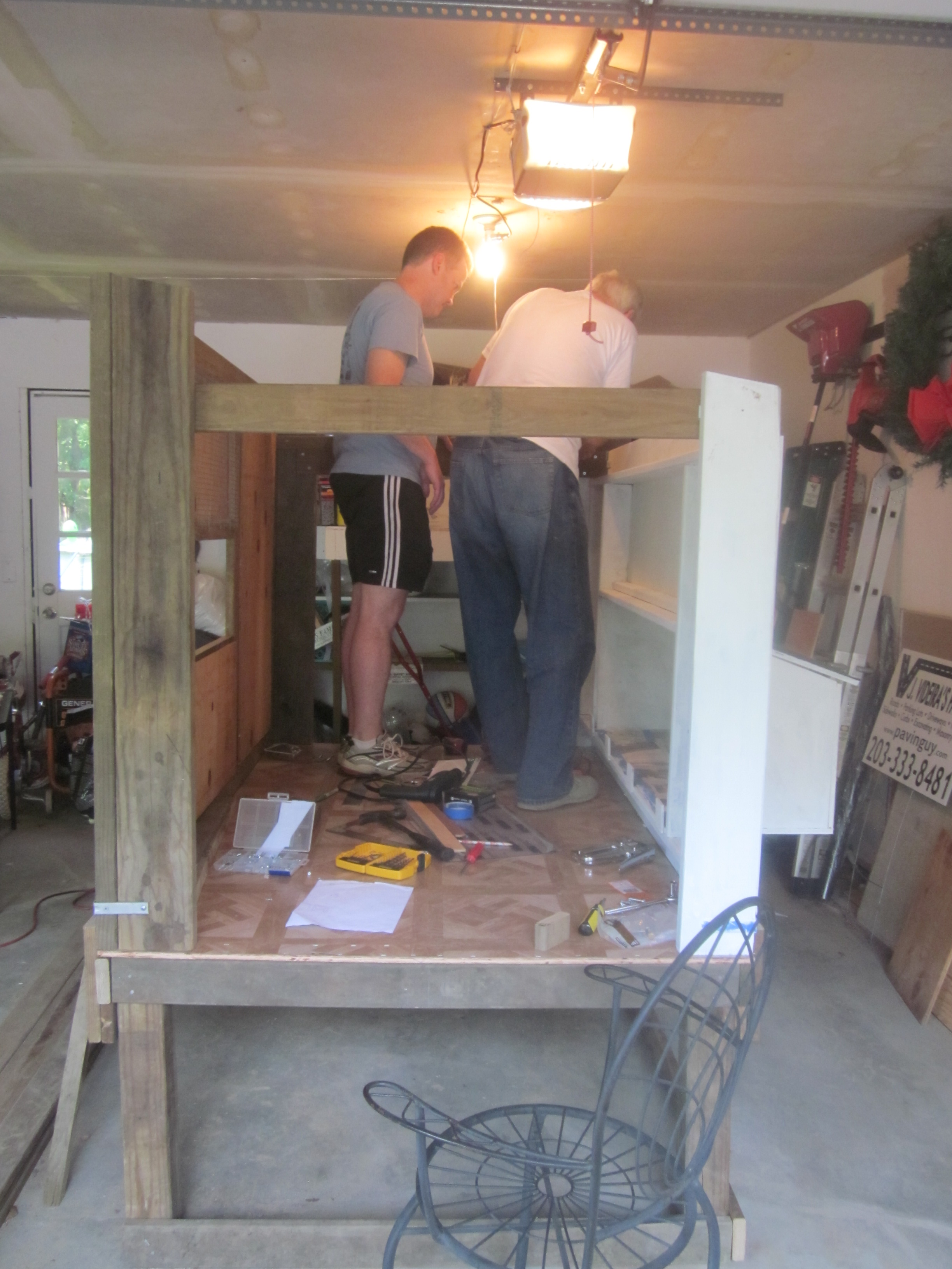 My husband and father working on the coop