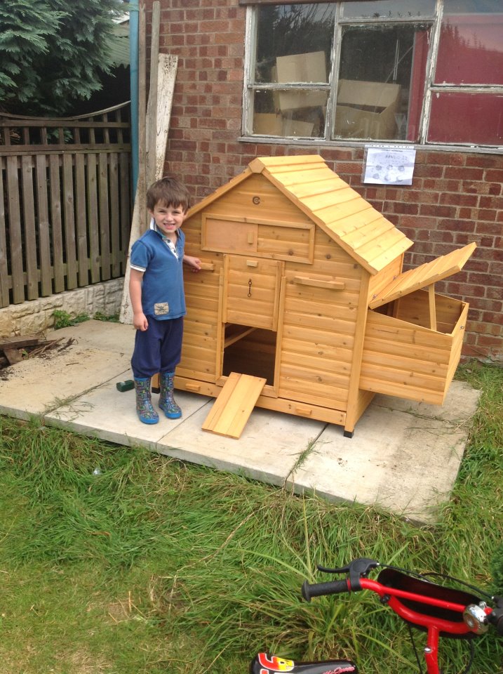 My little 4 year old farmer Jake, this was when we first got the new chicken house.