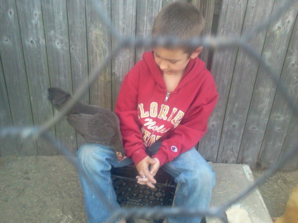 My sweet little man Matthew and one of our banty hens!