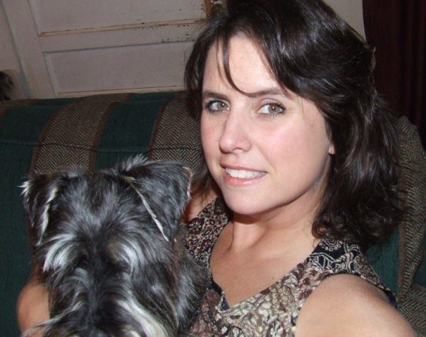 Myself and Ozzy, the Schnauzer.  He won't make eye contact with a camera.  Back when I had short hair and a tan.