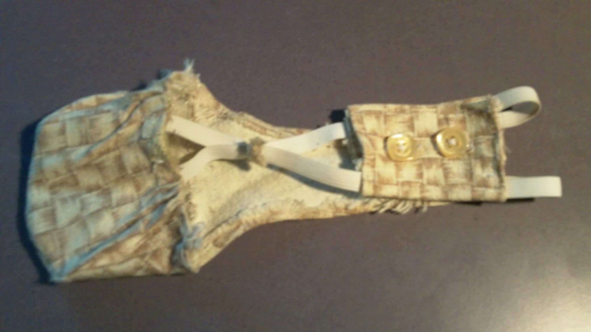 Nappy version 1... the pouch was too small and its looking a little worn after a week of hateful chicken abuse!