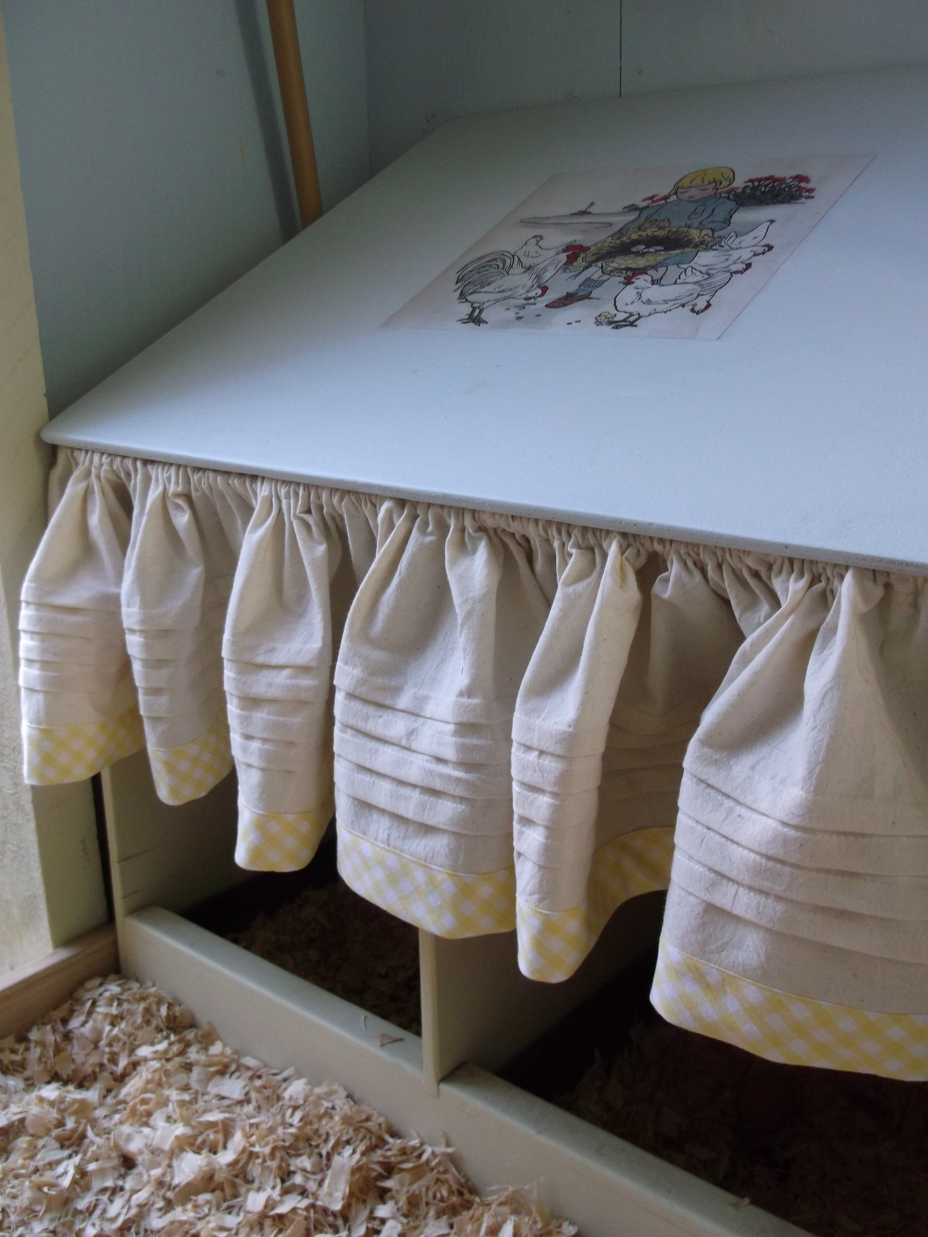 Nest box curtains complete.My 1[so far] laying girl approves.She has tried out both boxes.