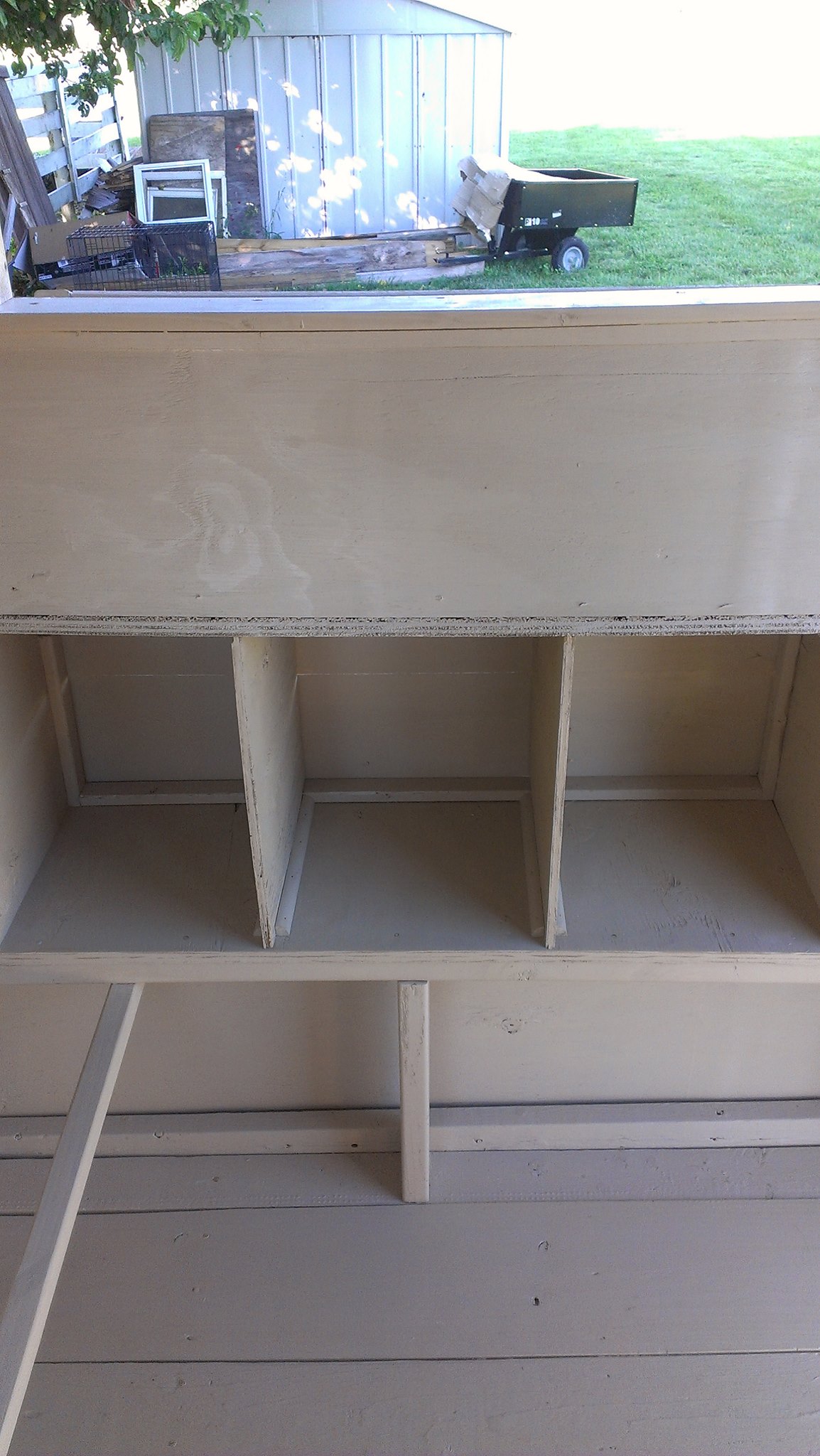 Nest boxes and dividers. I used quarter round on each side of the dividers as "bookends" so the dividers can be pulled out for easy cleaning.