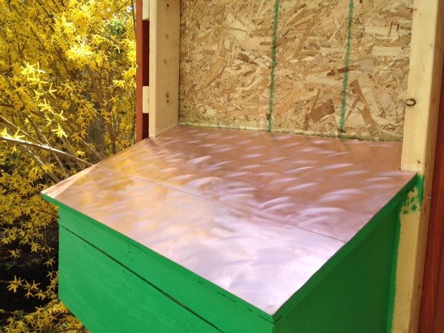 Nesting box roof, pure copper that Karen swirled with an orbital sander.