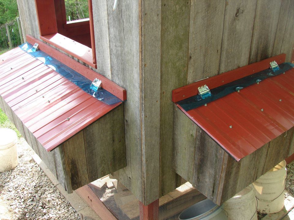 Nesting box roofs are on. Spring loaded hinges... and a hook to keep coons out.