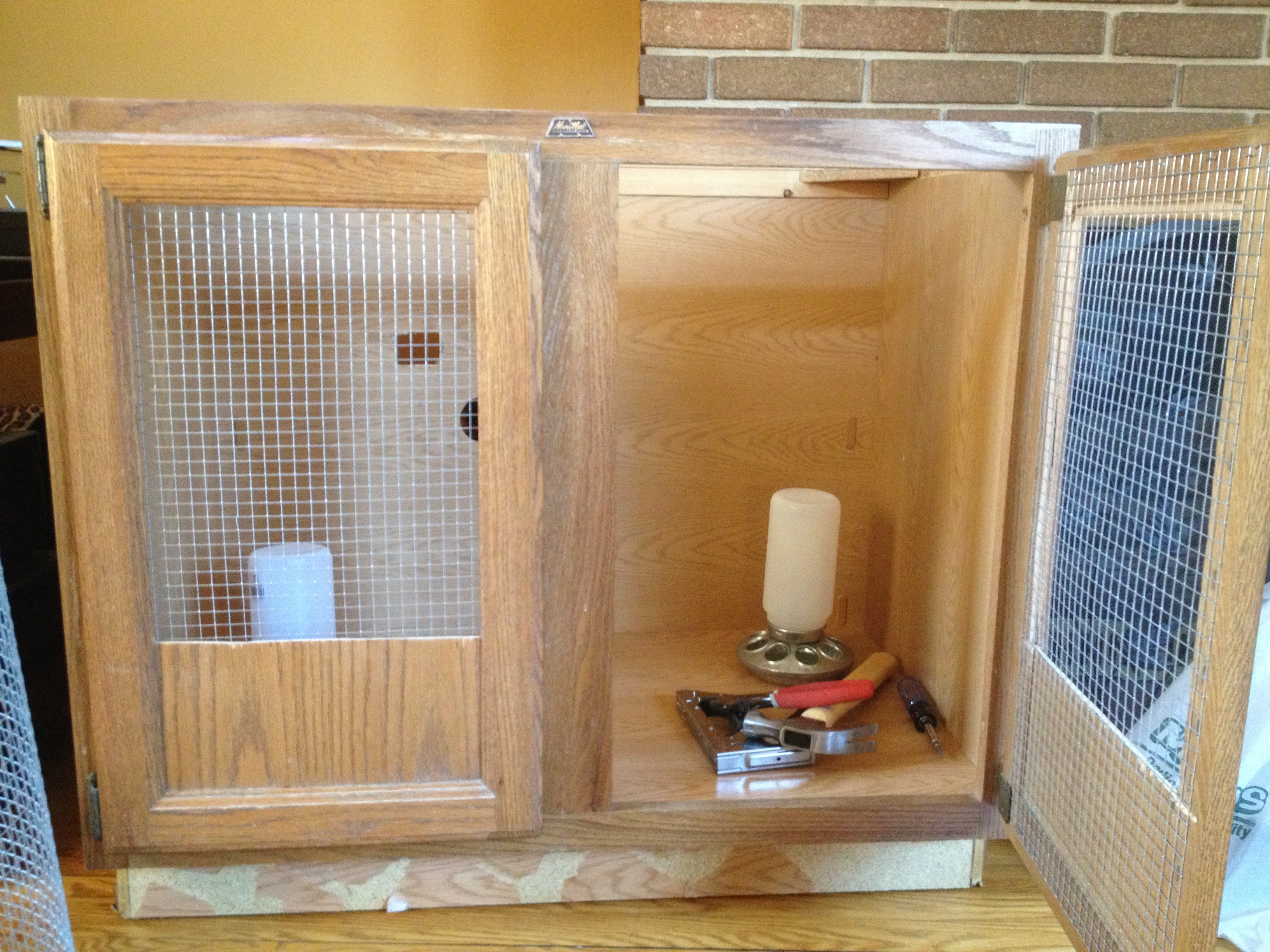 New brooder from an old bathroom sink cabinet.
