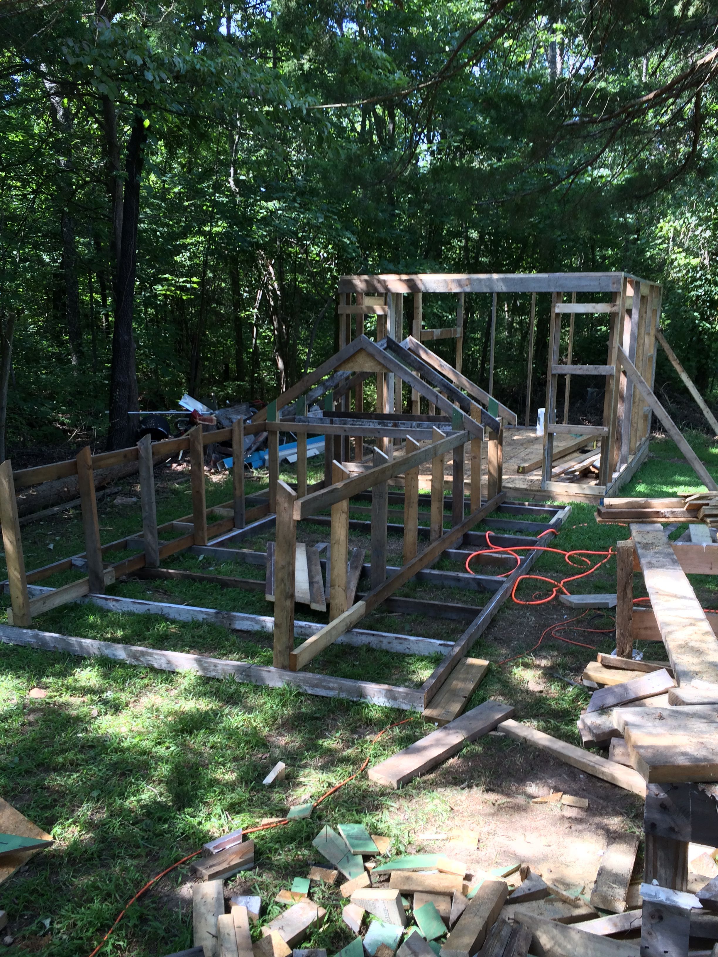 Now the roof. Given that I am building this by myself I thought it might be easier to build the roof/storage section on the ground and then raise it up later. I built the 2'x4 ceiling and rim joists then the center section. I did not attach them together as I figured it would be easier to put them up separately as well.